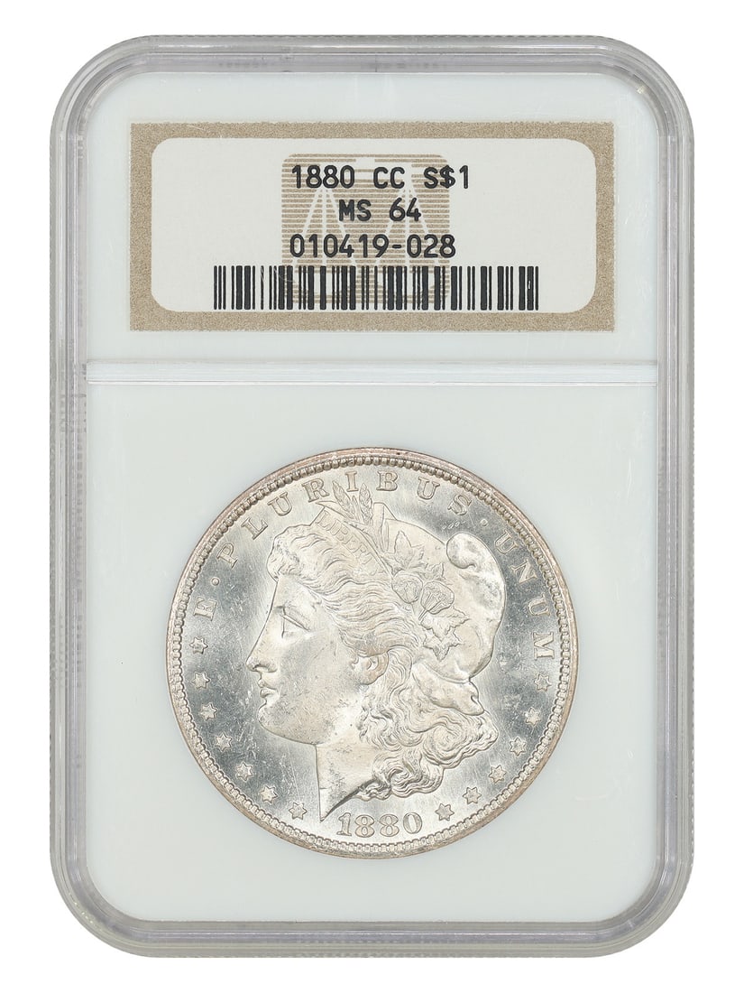 1880-CC $1 NGC MS64 Morgan Dollar: 1880-CC $1 NGC MS64 Morgan Dollar A rare and highly sought-after 1880-CC Morgan Dollar, certified by the Numismatic Guaranty Corporation (NGC) as MS64, is up for auction. This uncirculated coin boasts