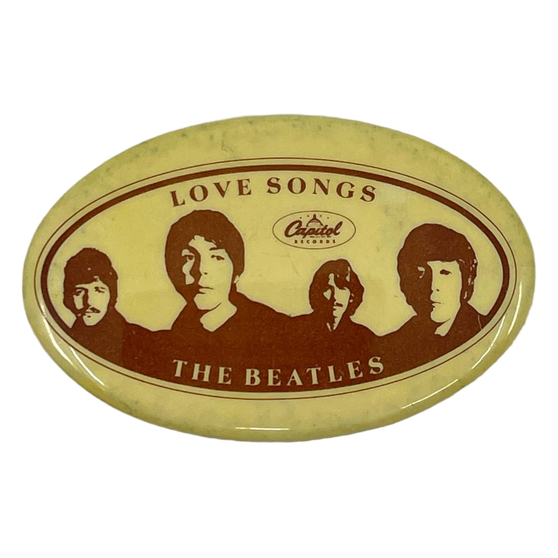 Beatles Love Songs Promo Button (1977): Beatles Love Songs Promo Button (1977) Get ready to relive the magic of 1970s rock with this authentic vintage Beatles Love Songs promo pin, dated 1977. Made from original materials and in good condit