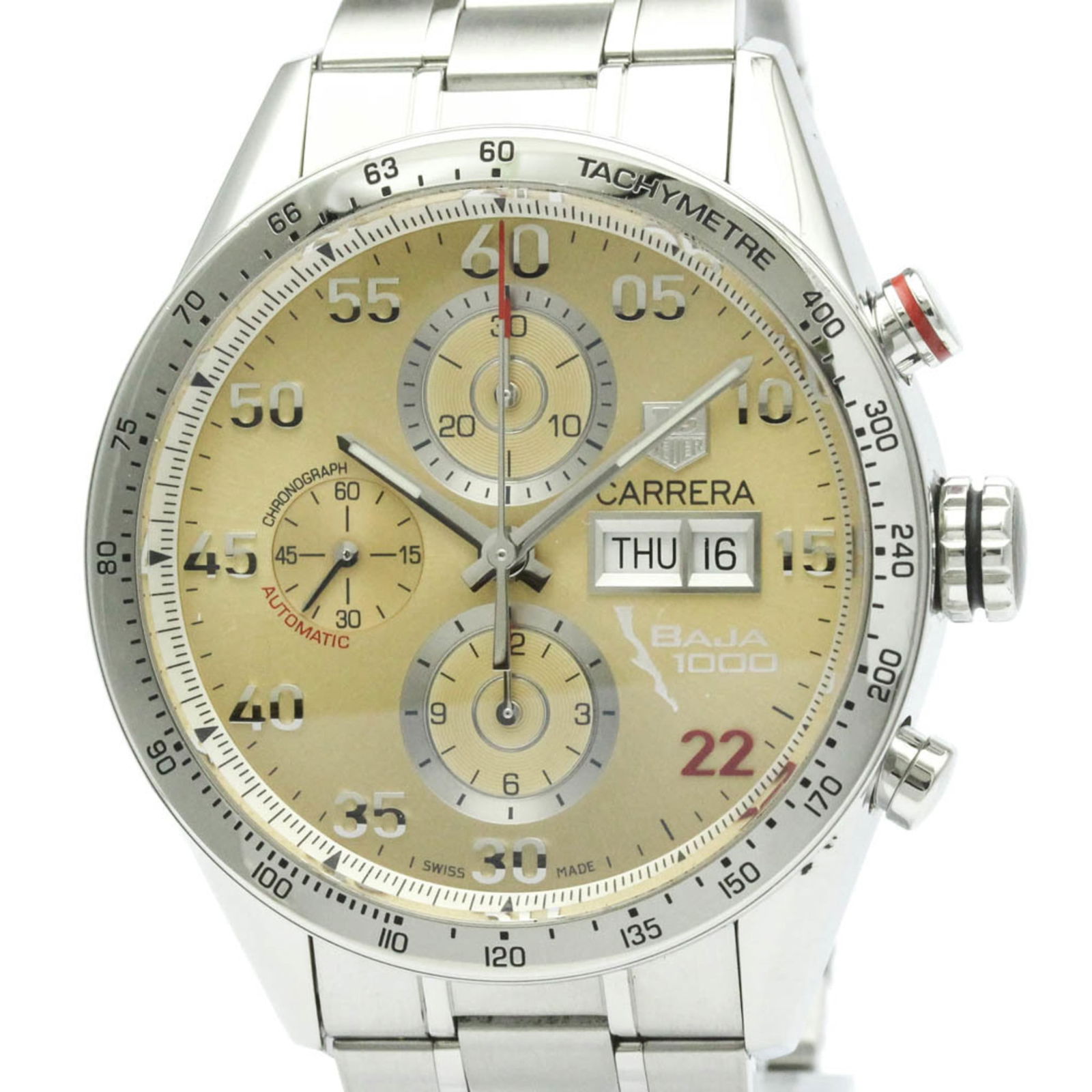 Wristwatch Tag Heuer: Wristwatch Tag Heuer A pre-owned Tag Heuer wristwatch that exudes sporty sophistication, boasting a sleek 43mm stainless steel case and band, paired with a distinctive beige dial and gold accents. Wit