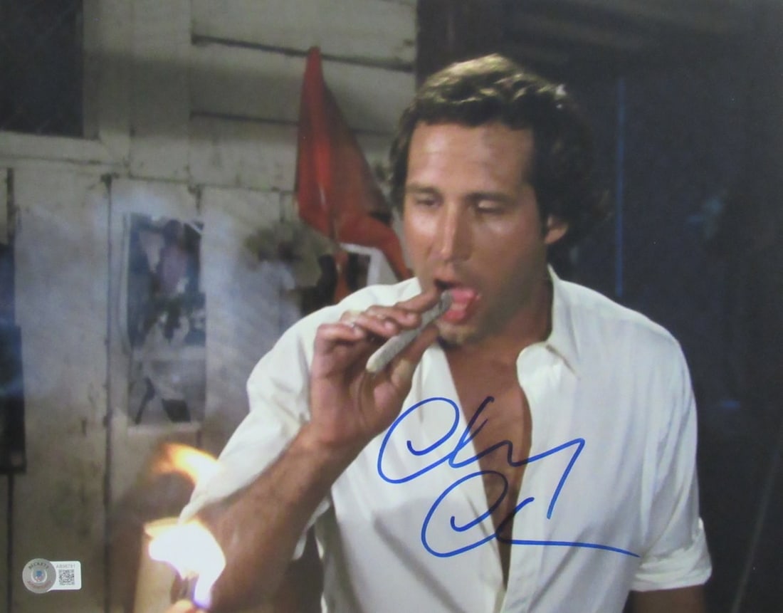 Chevy Chase Autographed 11x14 Photo (Beckett #189749): Chevy Chase Autographed 11x14 Photo (Beckett #189749) Meet the ultimate sports memorabilia collectible for any Chevy Chase fan - an autographed 11x14 photo of the legendary comedian and actor, authent