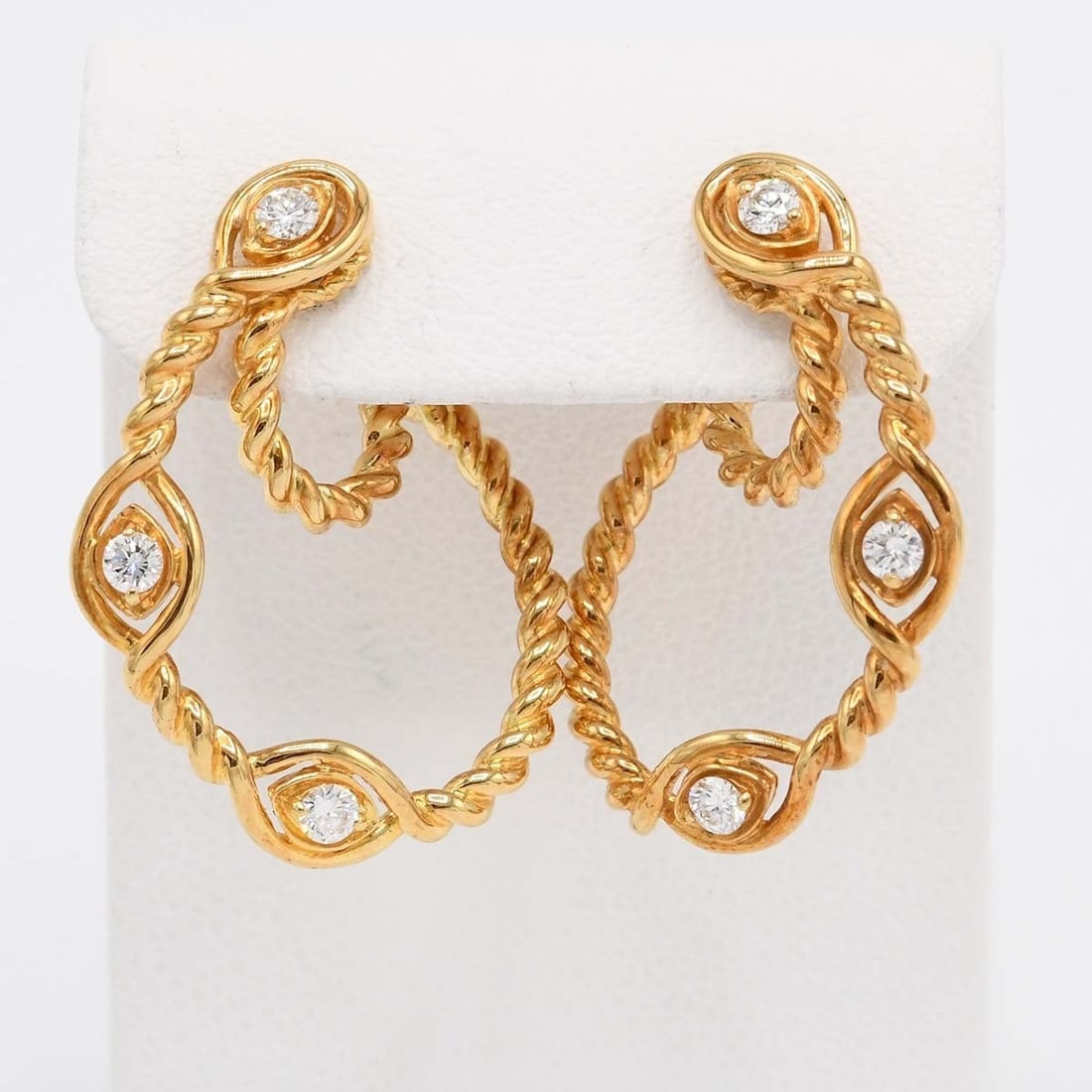 Earrings Vintage Christian Dior Diamond 18k Yellow Gold Twist Hoop Screw Back: Earrings Vintage Christian Dior Diamond 18k Yellow Gold Twist Hoop Screw Back Elevate your style with these stunning vintage Christian Dior diamond earrings, showcasing six round diamonds in 18k yello