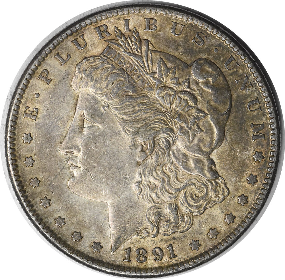 Uncertified 1891-S Morgan Silver Dollar AU Slider: Uncertified 1891-S Morgan Silver Dollar AU Slider A rare and beautiful piece of American history, this 1891-S Morgan Silver Dollar is a stunning example of the iconic design that has captivated collec