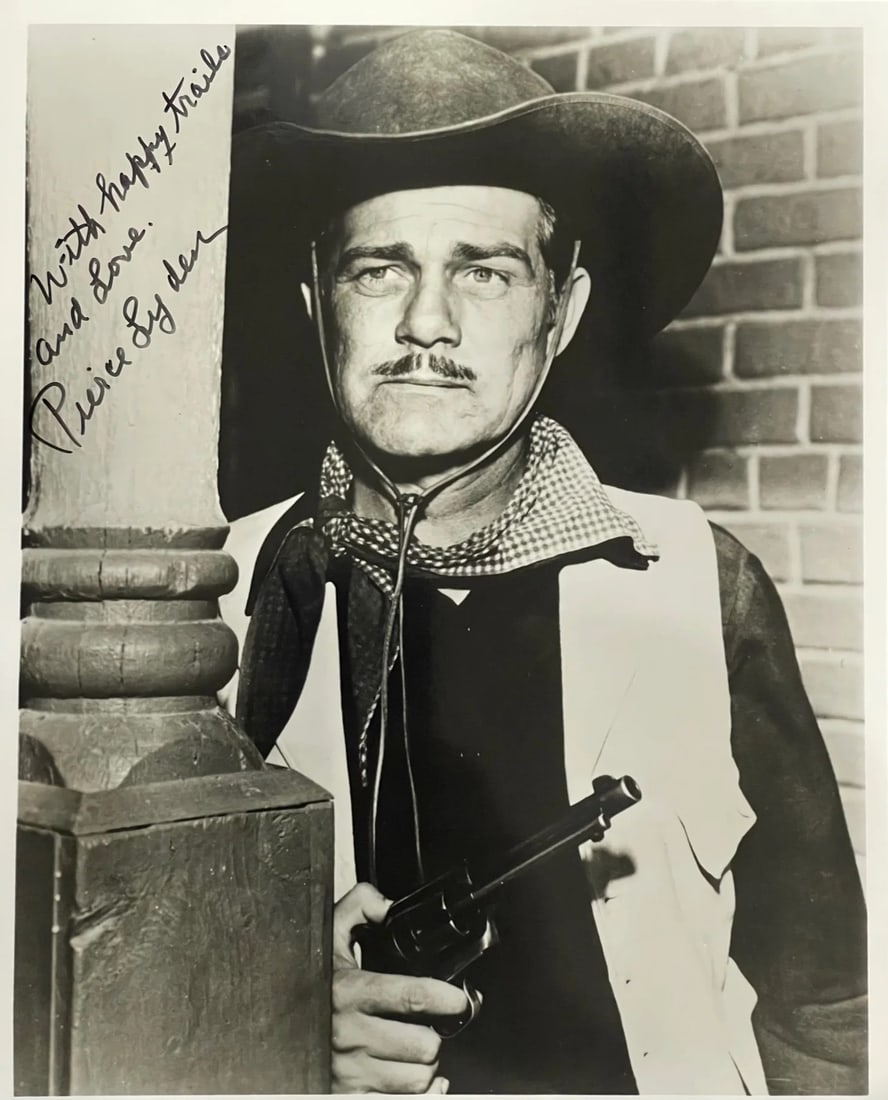 Photo Pierce Lyden Autographed 8x10 Celebrity: Photo Pierce Lyden Autographed 8x10 Celebrity Meet the iconic Pierce Lyden, captured in a rare and unique 8x10 celebrity photo signed by the star himself! With a heartfelt inscription of "With Happy T