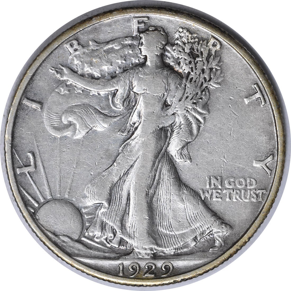 1929-S Walking Liberty Silver Half Dollar - No AW, EF, Uncertified: 1929-S Walking Liberty Silver Half Dollar - No AW, EF, Uncertified Experience the iconic design of the 1929-S Walking Liberty Silver Half Dollar, featuring Adolph Alexander Weinman's elegant depiction