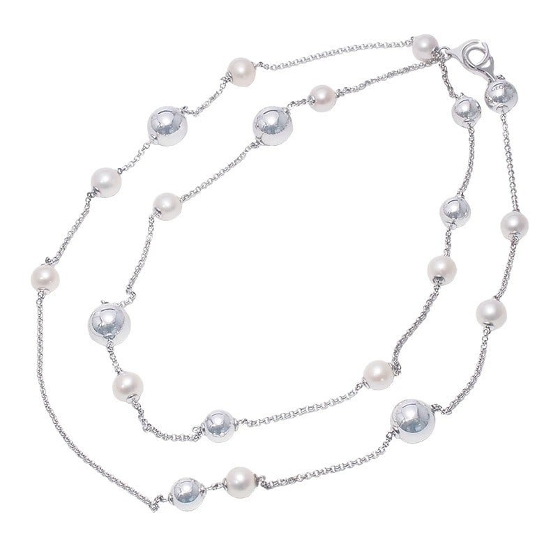 Georg Jensen Pearl & Silver Sphere Long Necklace, 38.5" with Original Box: Georg Jensen Pearl & Silver Sphere Long Necklace, 38.5" with Original Box Elevate your elegance with the Georg Jensen Pearl & Silver Sphere Long Necklace, a timeless masterpiece that combines sterling