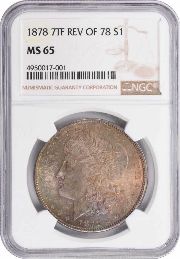 1878 Morgan Silver Dollar (7TF) MS65 NGC: 1878 Morgan Silver Dollar (7TF) MS65 NGC Rarity and beauty come together in this stunning 1878 Morgan Silver Dollar, certified MS65 by the Numismatic Guaranty Corporation (NGC). With its crisp details
