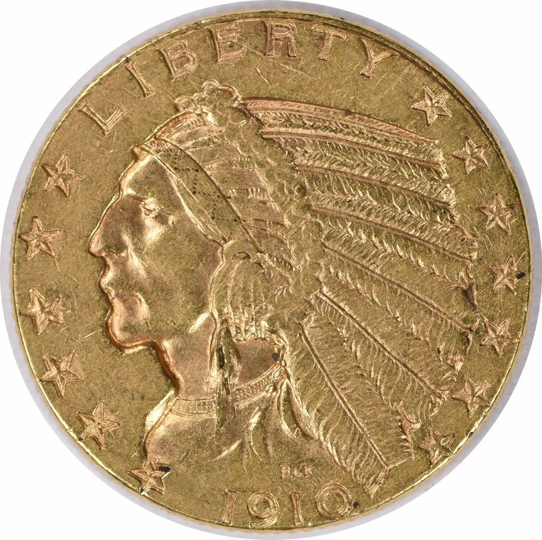 $5 Gold Indian (1910) AU, Uncertified: $5 Gold Indian (1910) AU, Uncertified A rare and beautiful piece of American numismatic history, this 1910 $5 Gold Indian coin is a stunning example of the Philadelphia Mint's craftsmanship. With its
