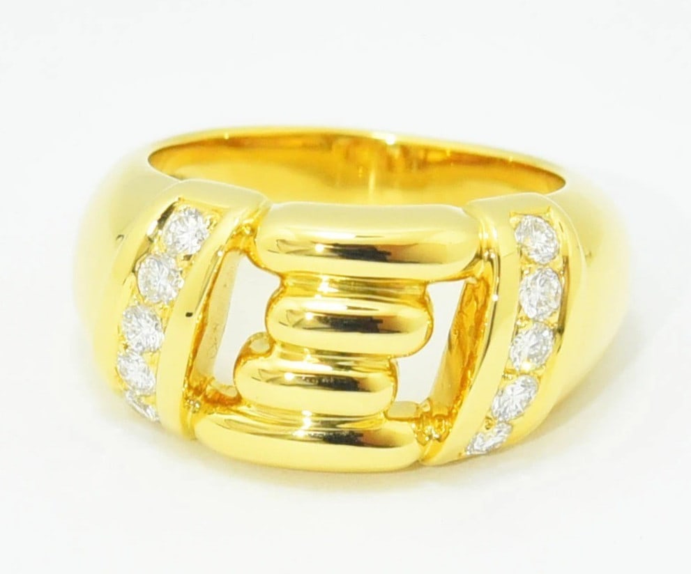 Vintage Boucheron 18k Yellow Gold Bold Volume Design Wide Ring US 6.25: Vintage Boucheron 18k Yellow Gold Bold Volume Design Wide Ring US 6.25 Experience the timeless elegance of Boucheron's 18k yellow gold masterpiece, boasting 10 round diamonds set in a bold volume desi