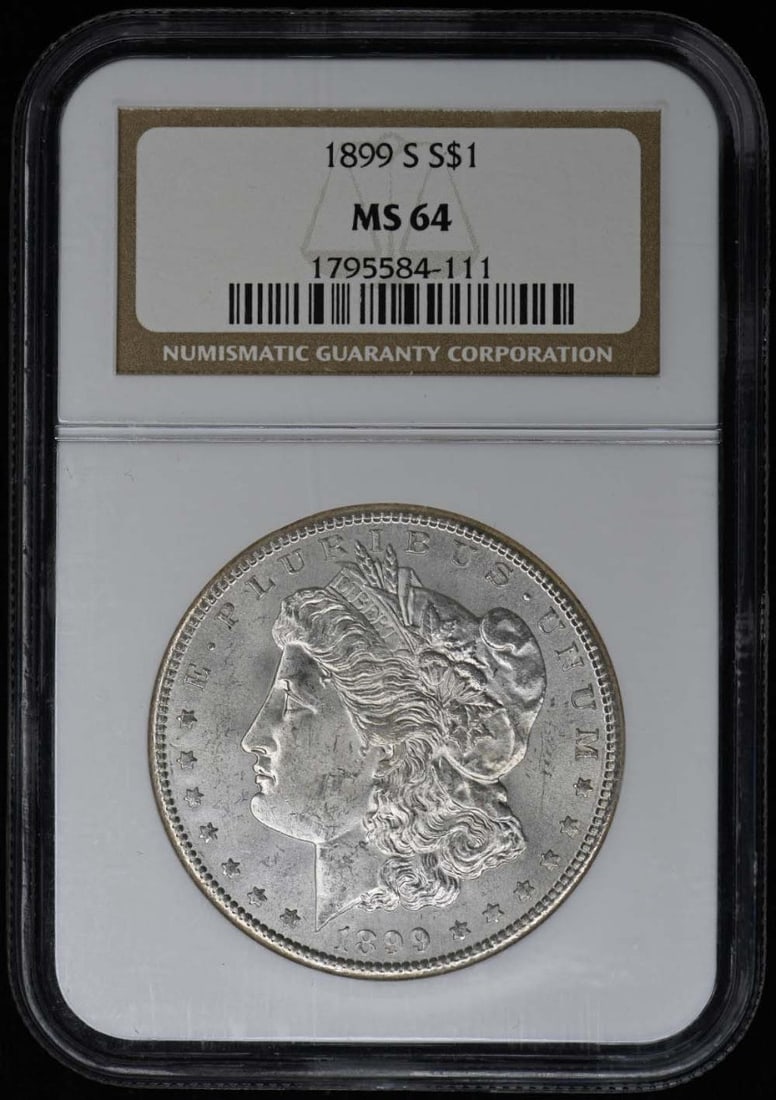 1899-S Morgan Dollar, NGC MS64: 1899-S Morgan Dollar, NGC MS64 Experience the majesty of the 1899-S Morgan Dollar, certified by the Numismatic Guaranty Corporation (NGC) as MS64. This stunning coin boasts its original uncirculated
