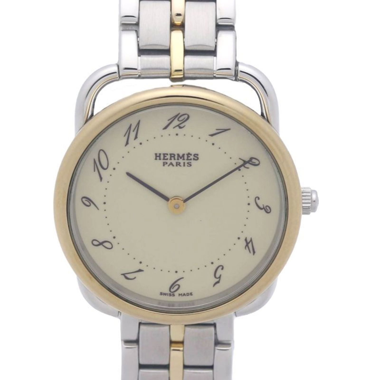Wristwatch Hermes: Wristwatch Hermes A stunning gold plated Hermes wristwatch, boasting an elegant ivory dial and sleek 25mm case, is up for grabs in excellent condition. With its durable stainless steel band and intric