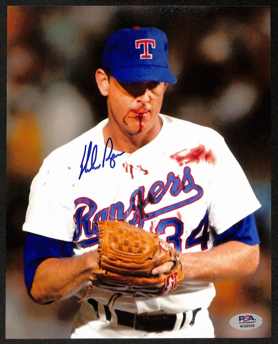 Nolan Ryan HOF Autographed 8x10 Blood Photo (PSA/ DNA) - Texas Rangers: Nolan Ryan HOF Autographed 8x10 Blood Photo (PSA/ DNA) - Texas Rangers Experience the iconic presence of Nolan Ryan, one of baseball's most dominant pitchers, in this rare and highly authentic 8x10 bl