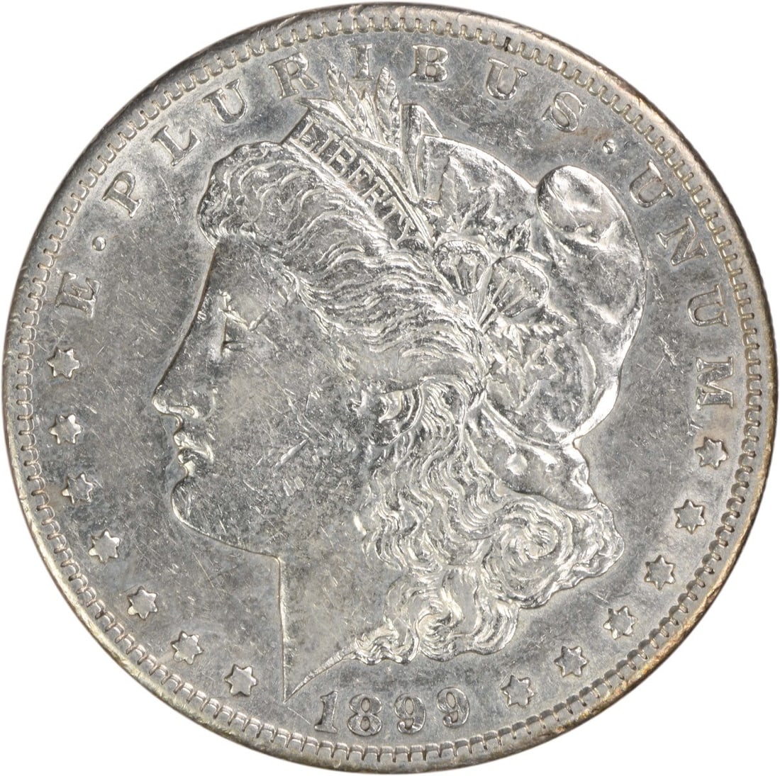 Uncertified 1899-S Morgan Silver Dollar EF: Uncertified 1899-S Morgan Silver Dollar EF A rare and beautiful 1899-S Morgan Silver Dollar, certified EF (Extremely Fine) condition, boasts stunning reeded edges and a rich history as one of the most