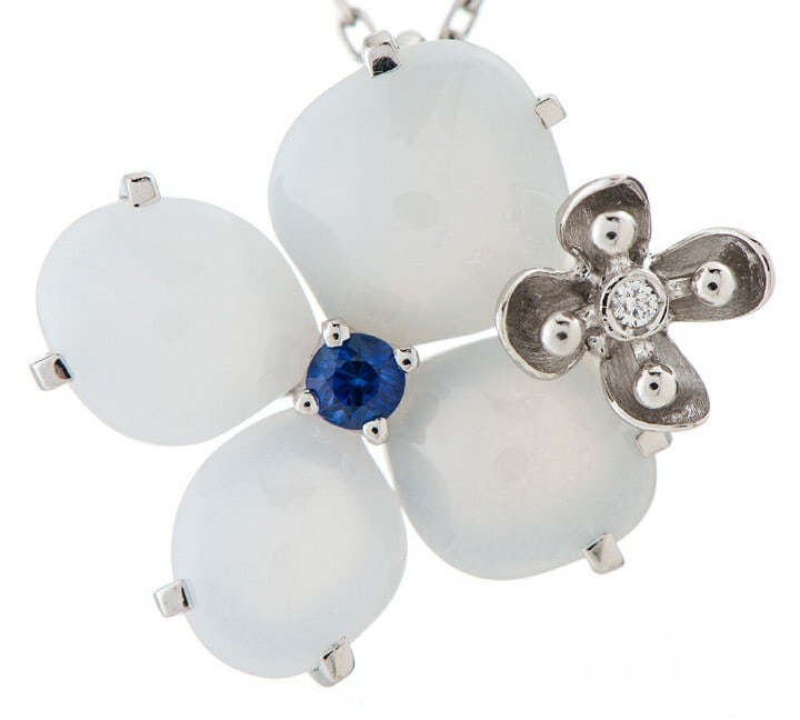 Chaumet Hortensia Opal Sapphire & Diamond 18k White Gold Flower Pendant Necklace: Chaumet Hortensia Opal Sapphire & Diamond 18k White Gold Flower Pendant Necklace Elegant and sophisticated, the Chaumet Hortensia Opal Sapphire & Diamond 18k White Gold Flower Pendant Necklace is a tr