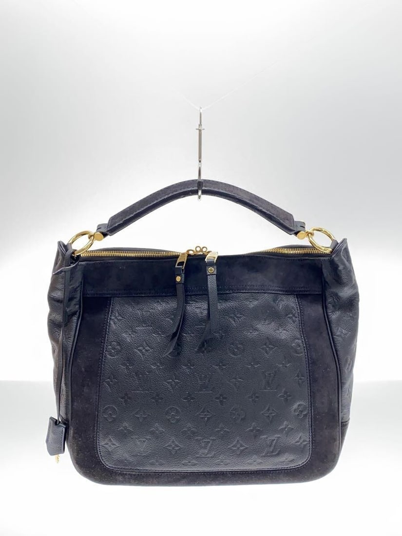 424728 Auth Louis Vuitton Audacieuse MM M40589 Monogram Empreinte Leather F/ S: 424728 Auth Louis Vuitton Audacieuse MM M40589 Monogram Empreinte Leather F/ S Experience the timeless elegance of Louis Vuitton with this stunning Audacieuse MM handbag, boasting the iconic Monogram