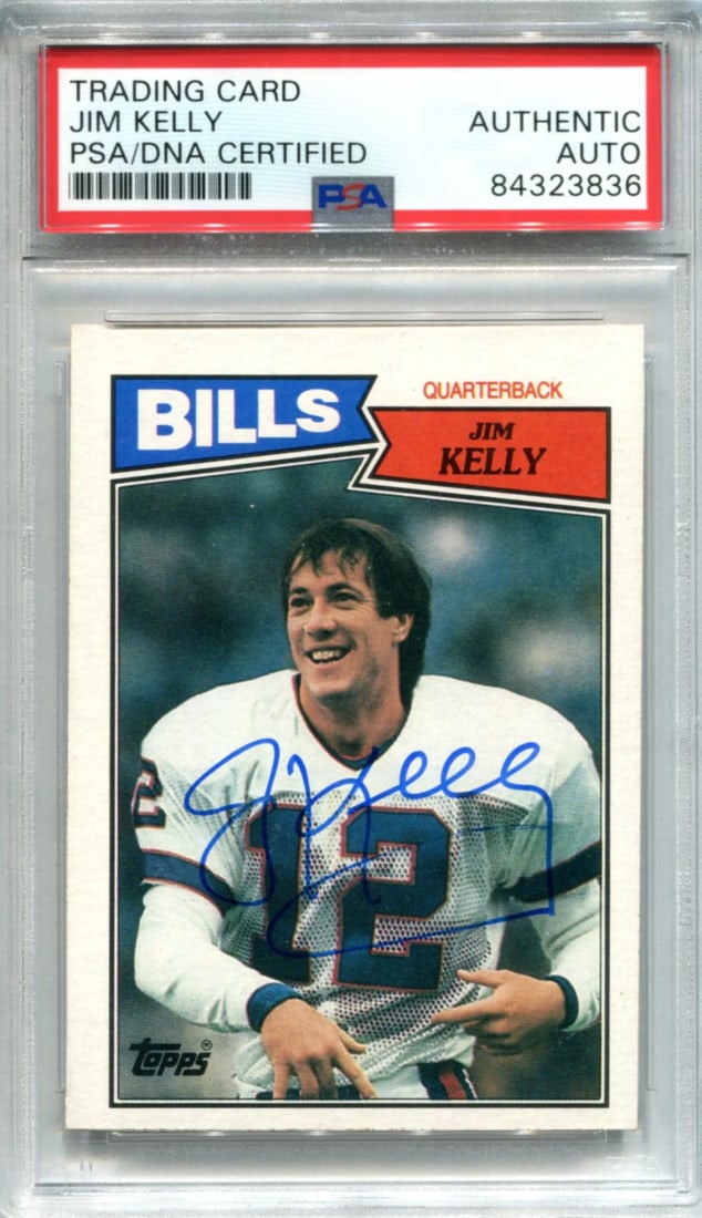 (PSA) Jim Kelly Autographed 1987 Topps Card: (PSA) Jim Kelly Autographed 1987 Topps Card Get ready to relive the excitement of Jim Kelly's playing career with this authentic 1987 Topps card, signed in blue sharpie by the legendary Buffalo Bills