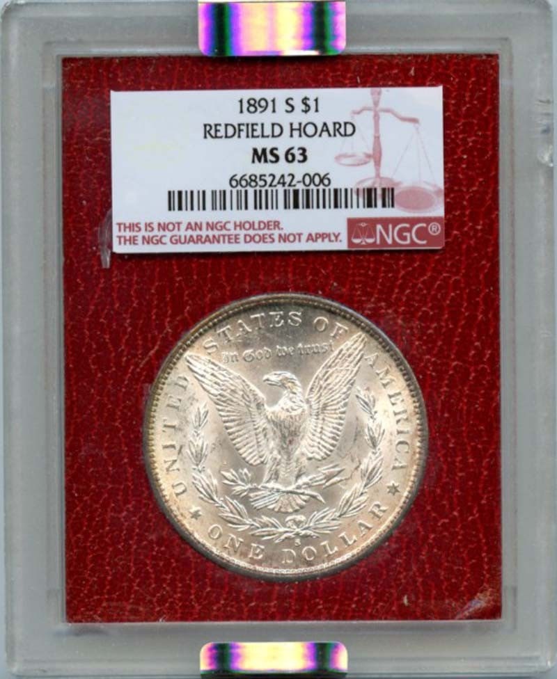 1891-S Redfield Hoard Morgan Dollar NGC MS63: 1891-S Redfield Hoard Morgan Dollar NGC MS63 A rare and highly sought-after 1891-S Redfield Hoard Morgan Dollar, certified MS63 by the Numismatic Guaranty Corporation (NGC), is up for auction. This st