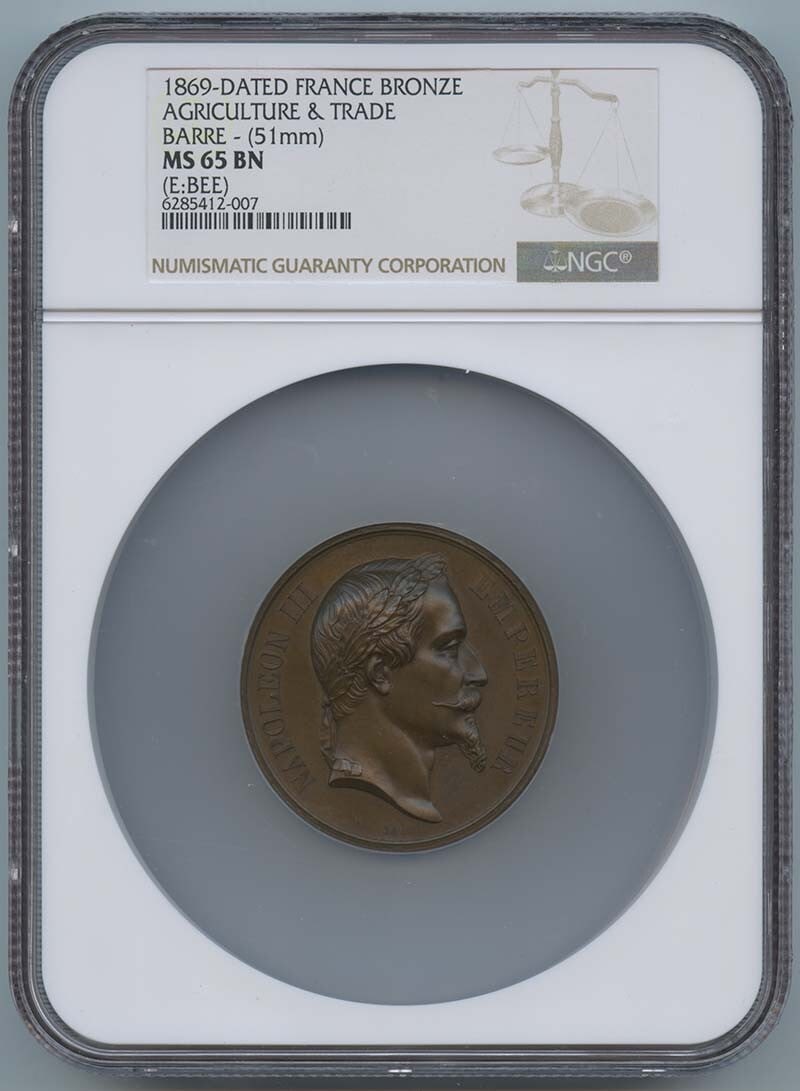 51mm 1869 Dated France Agriculture & Trade Bronze Medal NGC MS65 Barre: 51mm 1869 Dated France Agriculture & Trade Bronze Medal NGC MS65 Barre Experience the rich history of France with this stunning 51mm bronze medal, dated 1869 and certified by NGC as MS65 Uncirculated.