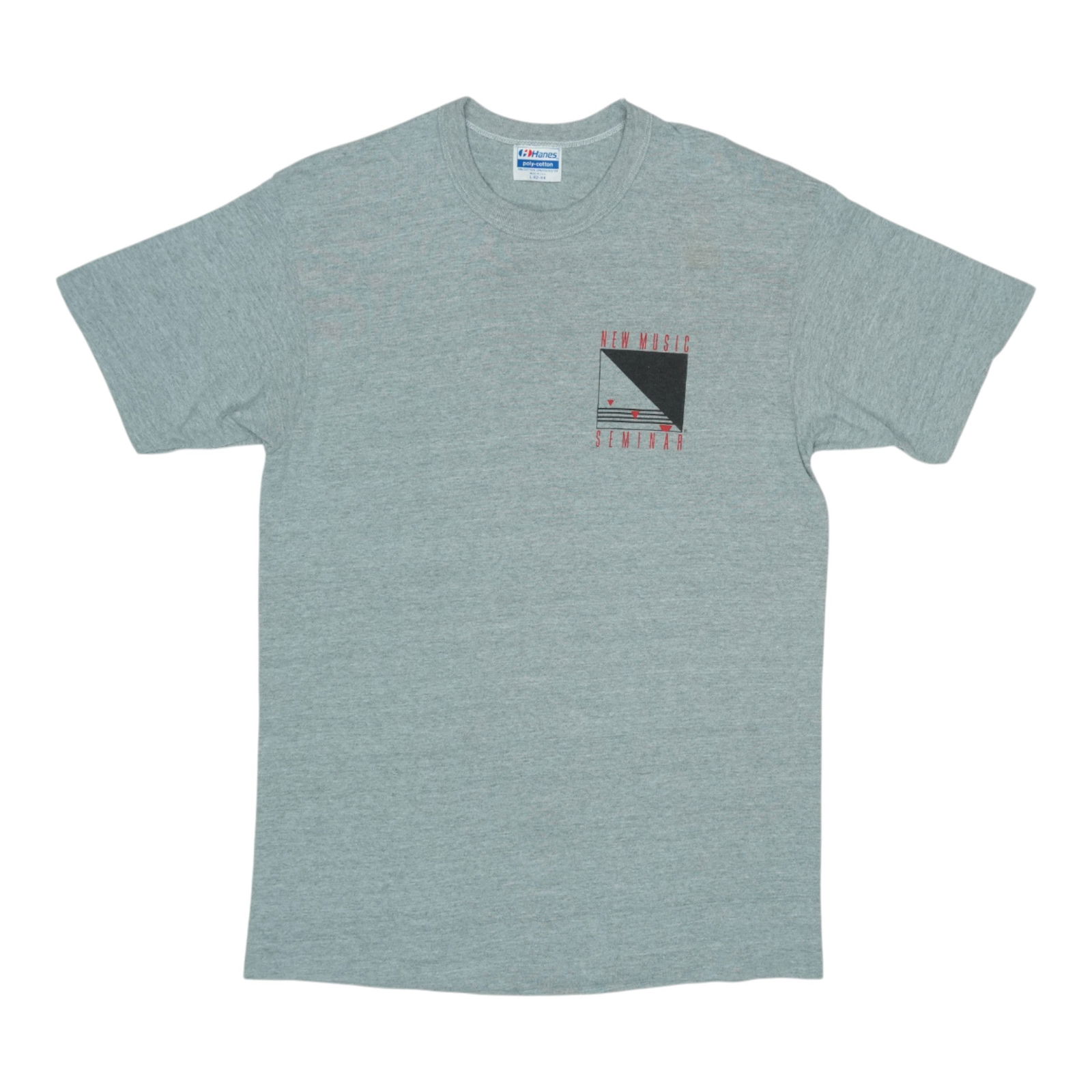 Shirt 1980s New Music Seminar: Shirt 1980s New Music Seminar Get ready to rock with this authentic 1980s New Music Seminar shirt, featuring a classic grey blend and pit-to-pit design that's sure to turn heads. Measuring in at 19" p