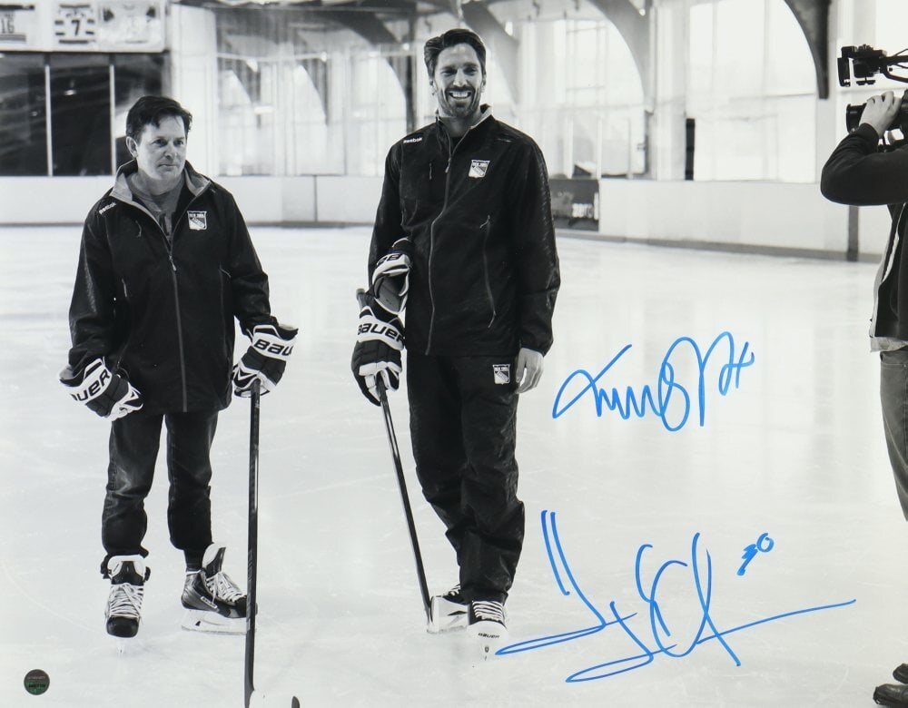 188760 Henrik Lundqvist & Michael J. Fox Dual Signed/ Auto 11x14 Photo Steiner: 188760 Henrik Lundqvist & Michael J. Fox Dual Signed/ Auto 11x14 Photo Steiner Get ready to own a piece of hockey history with this incredible 11x14 photo signed by two legends - Henrik Lundqvist,