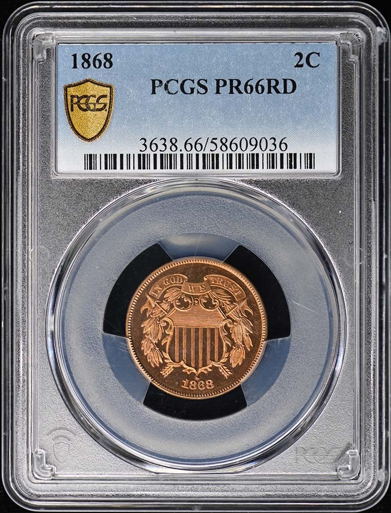 PR66RD 1868 2C Two Cent Piece PCGS: PR66RD 1868 2C Two Cent Piece PCGS Experience the rare beauty of an 1868 Two Cent Piece, certified by PCGS as PR66RD, one of the highest grades for this iconic coin. Struck in Philadelphia and boastin