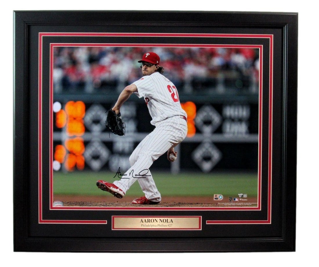 Aaron Nola Autographed 16x20 Photo (Philadelphia Phillies) - Fanatics Framed: Aaron Nola Autographed 16x20 Photo (Philadelphia Phillies) - Fanatics Framed Get ready to show off your Phillies pride with an authentic autograph from Aaron Nola, one of the league's top pitchers! Th