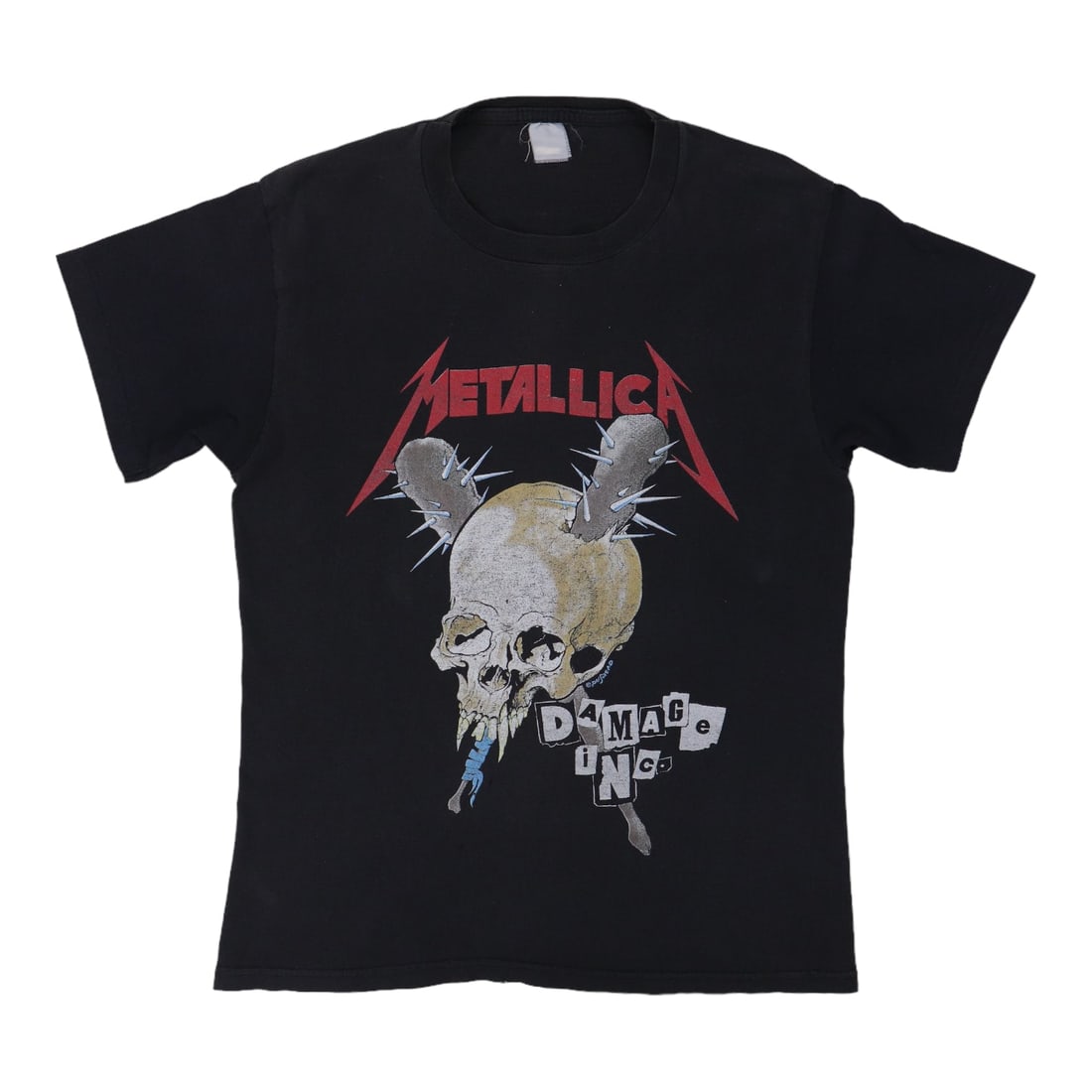 Metallica Damage Inc Tour Shirt (1980s): Metallica Damage Inc Tour Shirt (1980s) Get ready to rock with this authentic 1980s Metallica Damage Inc Tour Shirt, featuring bold front and back graphics that scream '80s metal. With its worn condit