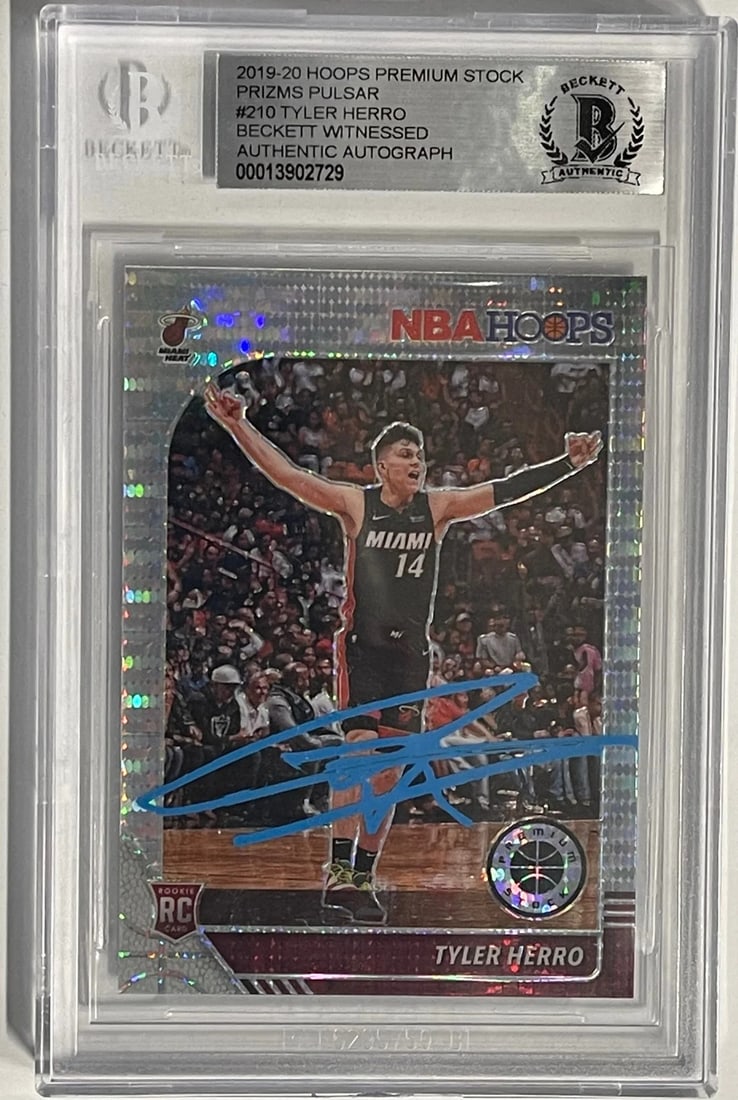 (Bec Tyler Herro Autographed 2019-20 Panini Hoops Premium Stock Rookie Card #210: (Bec Tyler Herro Autographed 2019-20 Panini Hoops Premium Stock Rookie Card #210 Get ready to add some Miami Heat flair to your collection with the autographed rookie card of Tyler Herro, signed in bl