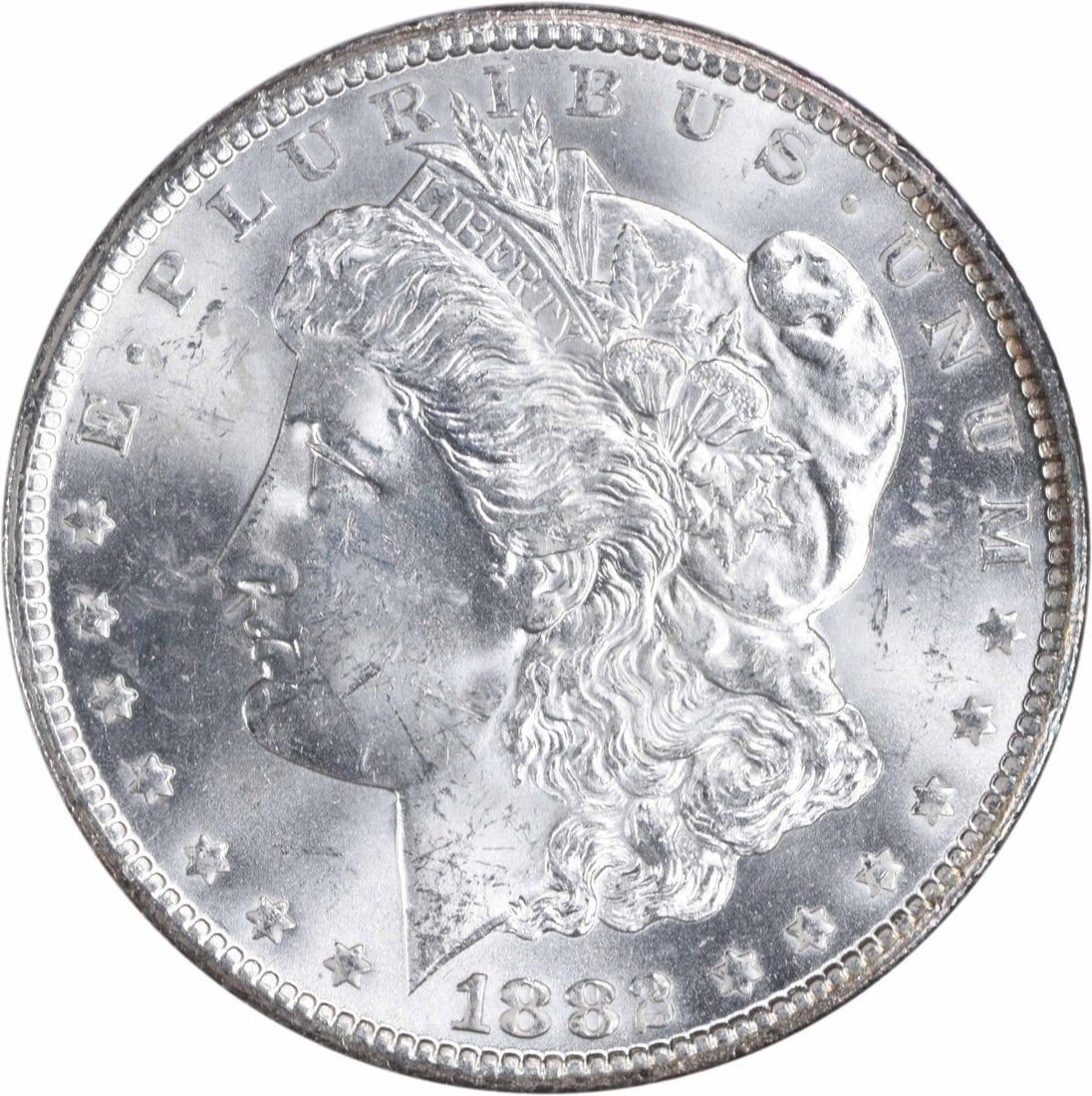 Morgan Silver Dollar (1882-CC), Choice BU, Uncertified: Morgan Silver Dollar (1882-CC), Choice BU, Uncertified Experience the majesty of the Morgan Silver Dollar, minted in 1882 with a CC mark indicating it was struck at the Carson City Mint. This Choice B