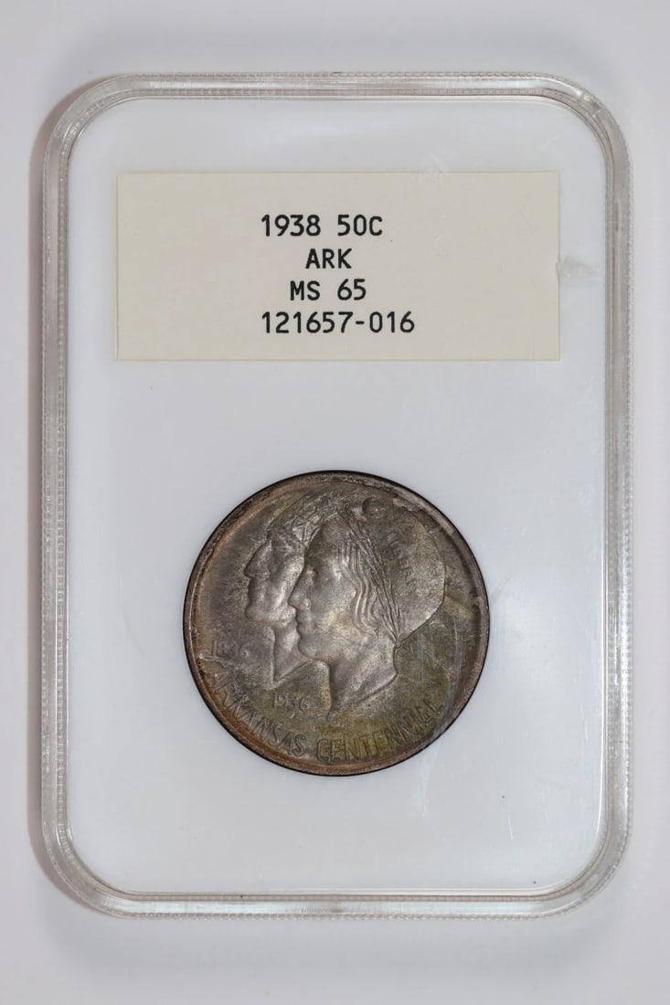 Arkansas Commemorative Half Dollar 1938 NGC MS65 White Label Rare: Arkansas Commemorative Half Dollar 1938 NGC MS65 White Label Rare Rarity seekers, take note! This 1938 Arkansas Commemorative Half Dollar is a true gem, boasting an impressive NGC MS65 grade and a stu