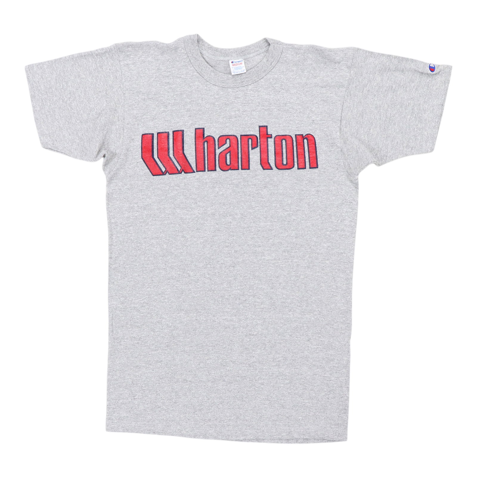Shirt 1980s Wharton: Shirt 1980s Wharton Get ready to rock with this authentic 1980s Wharton shirt, featuring a classic gray color and timeless design that still looks great today. With its medium fit and 50/50 poly/cotto