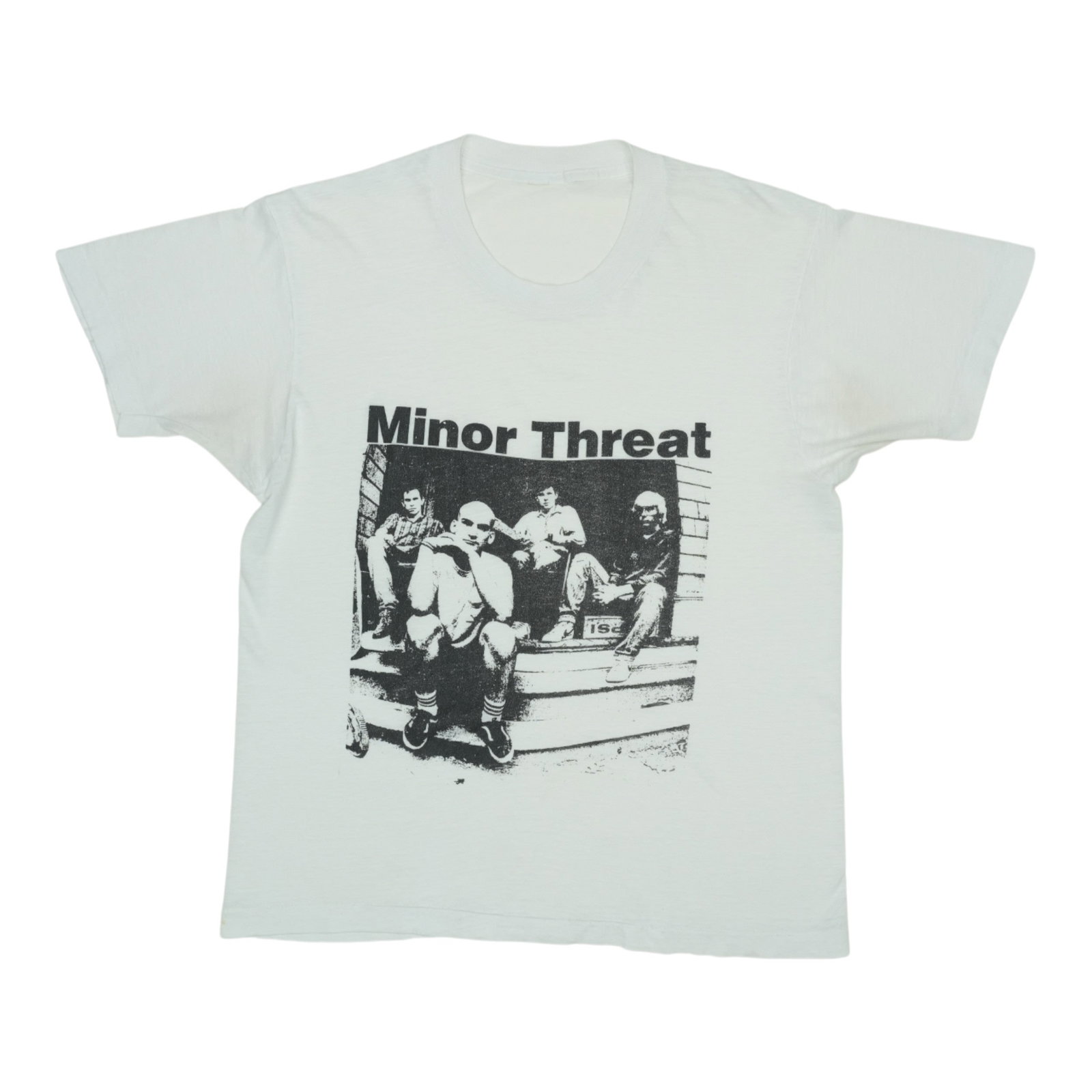 Shirt 1980s Minor Threat: Shirt 1980s Minor Threat Score the ultimate piece of punk rock history with this authentic 1980s Minor Threat shirt, boasting classic 50/50 poly/cotton construction and a timeless white color that sti