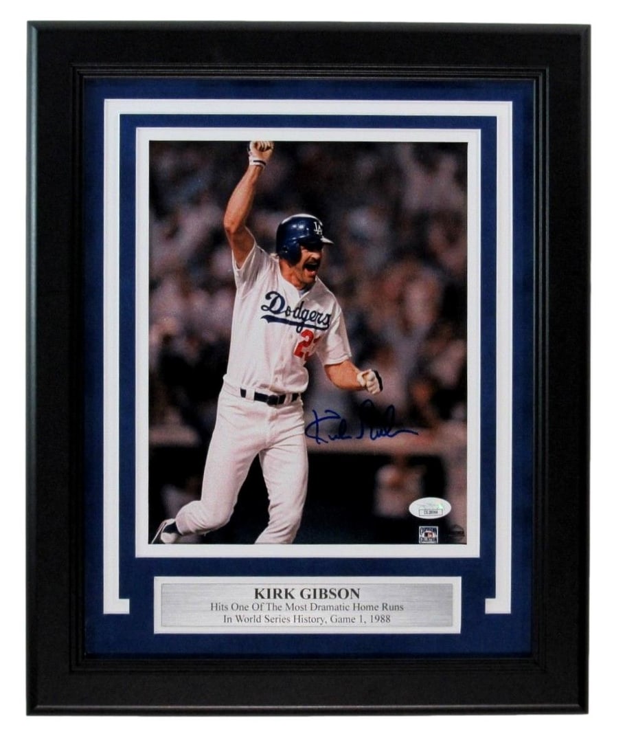 198137 Kirk Gibson Signed 8x10 Photo 1988 World Series Game 1 Dodgers Framed JSA: 198137 Kirk Gibson Signed 8x10 Photo 1988 World Series Game 1 Dodgers Framed JSA Get ready to relive one of baseball's most iconic moments with this authentic 8x10 photo of Kirk Gibson signing in fron