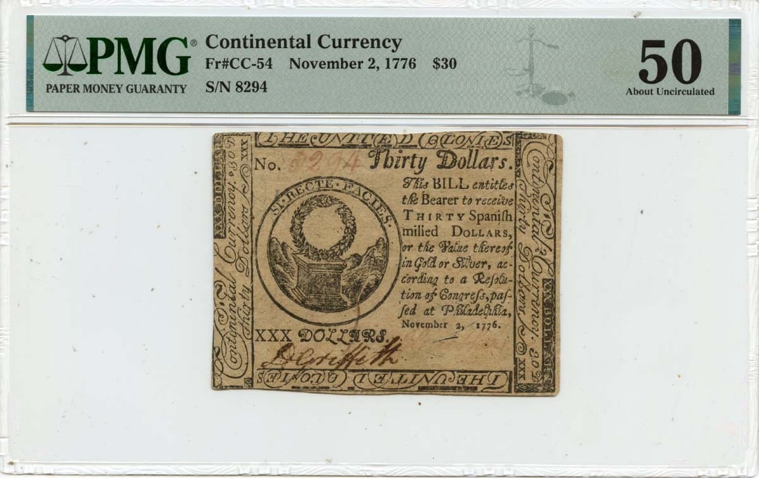 $30 Continental Currency FR#CC-54 PMG AU50 - 1776 November 2: $30 Continental Currency FR#CC-54 PMG AU50 - 1776 November 2 Experience the history of America's early currency with this rare 1776 Continental Currency note, graded AU50 by PMG and certified as circu