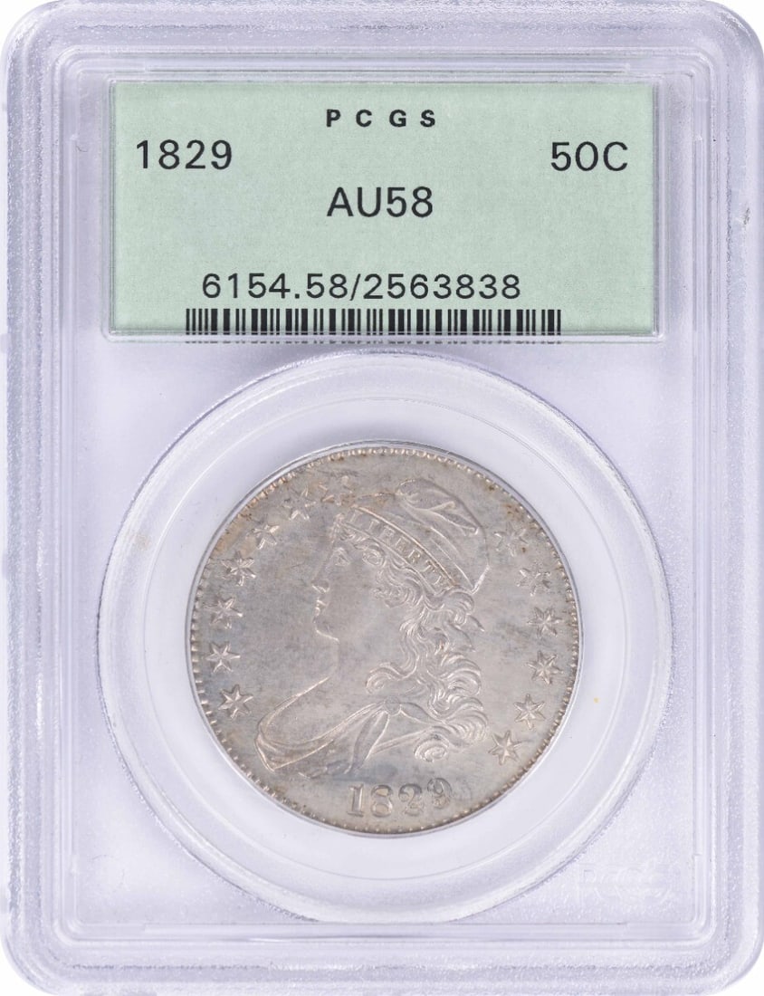 PCGS 1829 Bust Silver Half Dollar AU58: PCGS 1829 Bust Silver Half Dollar AU58 Experience the rich history of America's early currency with this stunning PCGS AU58 1829 Bust Silver Half Dollar, featuring John Reich's iconic design and boast