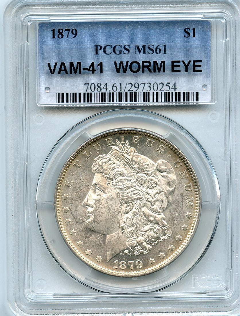MS61 C9295- 1879 VAM-41 WORM EYE MORGAN DOLLAR PCGS: MS61 C9295- 1879 VAM-41 WORM EYE MORGAN DOLLAR PCGS Experience the rare beauty of the 1879 Morgan Dollar, graded MS61 by PCGS and certified as Uncirculated. This stunning example boasts a striking wor