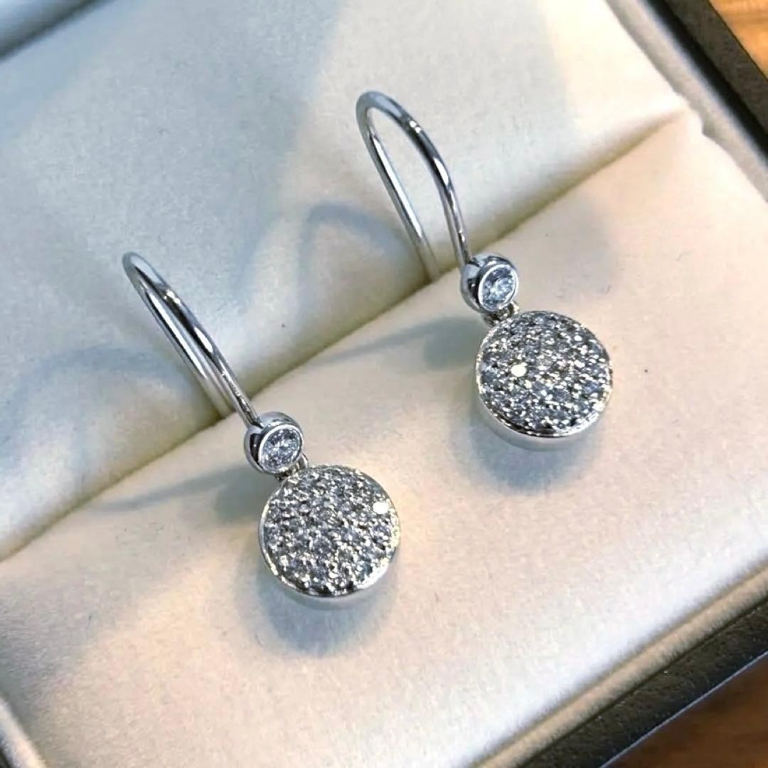condition Georg Jensen Pave Diamond Hook Earrings White Gold 18K In excellent: condition Georg Jensen Pave Diamond Hook Earrings White Gold 18K In excellent Elevate your style with these exquisite Georg Jensen pave diamond earrings, crafted in 18k white gold and set with sparkli