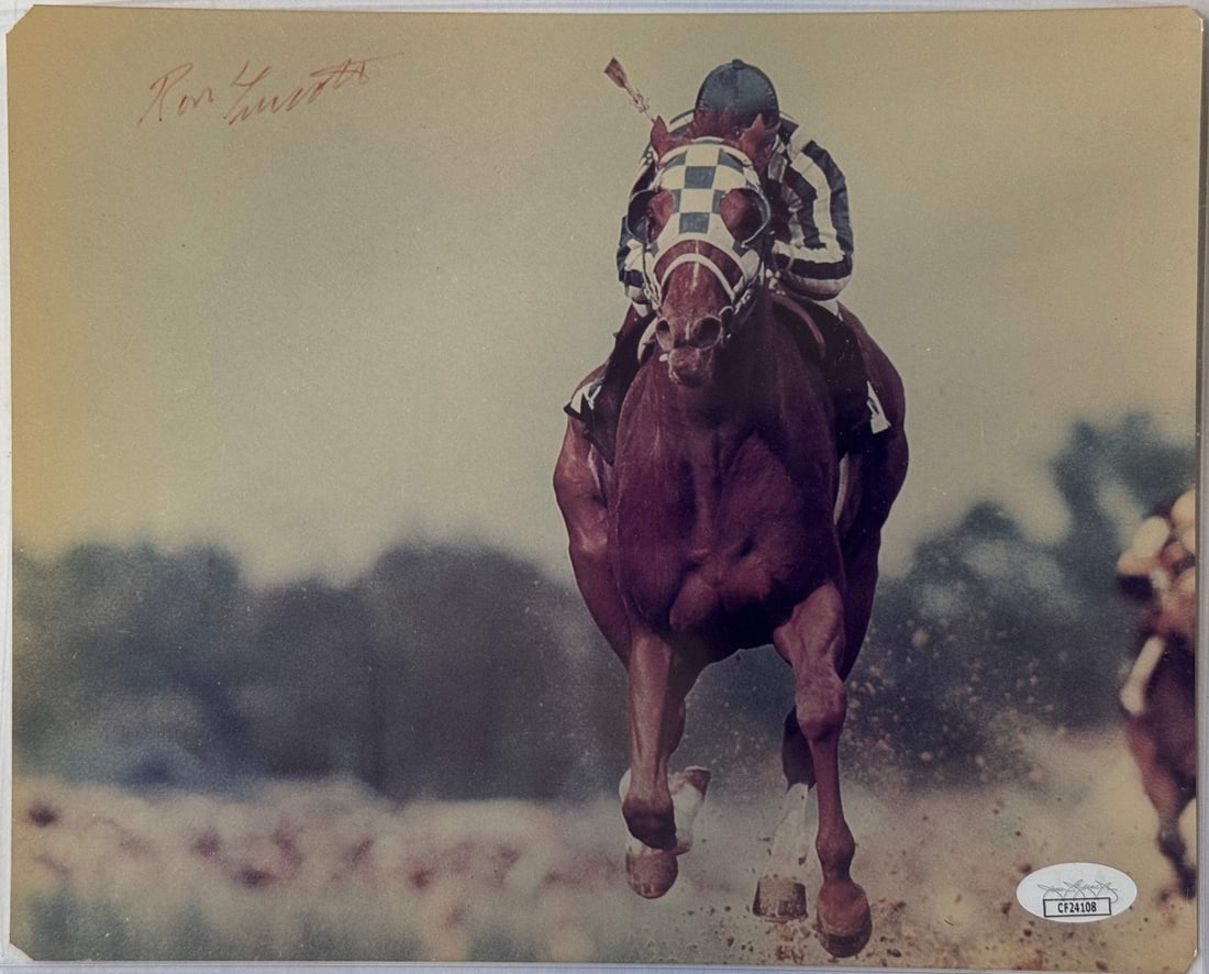 (JSA) Ron Turcotte Autographed Horse Racing 8x10 Photo Secretariat: (JSA) Ron Turcotte Autographed Horse Racing 8x10 Photo Secretariat Meet the iconic Secretariat, immortalized in a rare and authentic 8x10 photo signed by Ron Turcotte, the legendary jockey who rode th