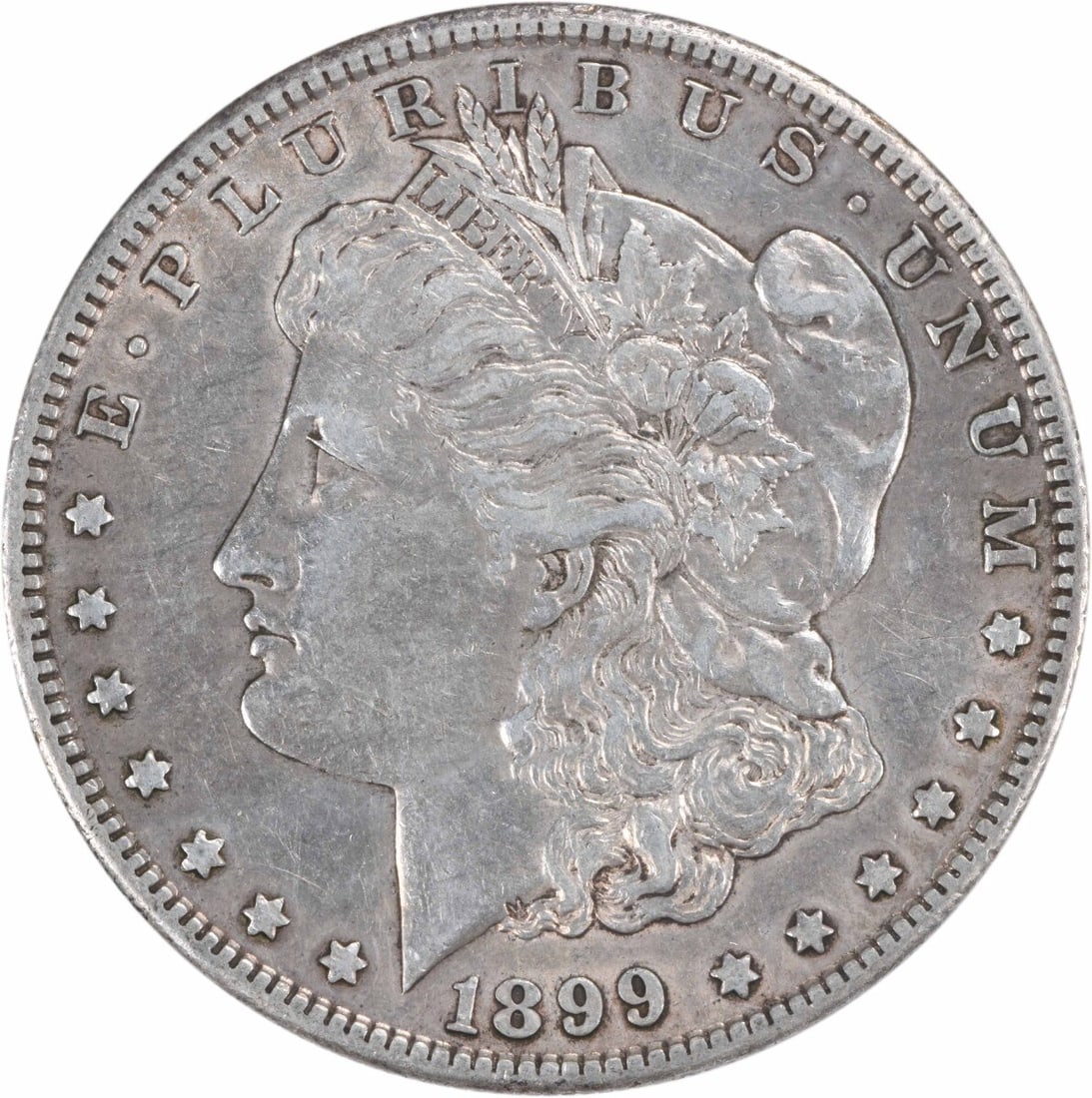 1899-S Morgan Silver Dollar - AU Uncertified: 1899-S Morgan Silver Dollar - AU Uncertified Experience the elegance of the 1899-S Morgan Silver Dollar, featuring George T. Morgan's iconic design and a rich history of being minted in San Francisco.