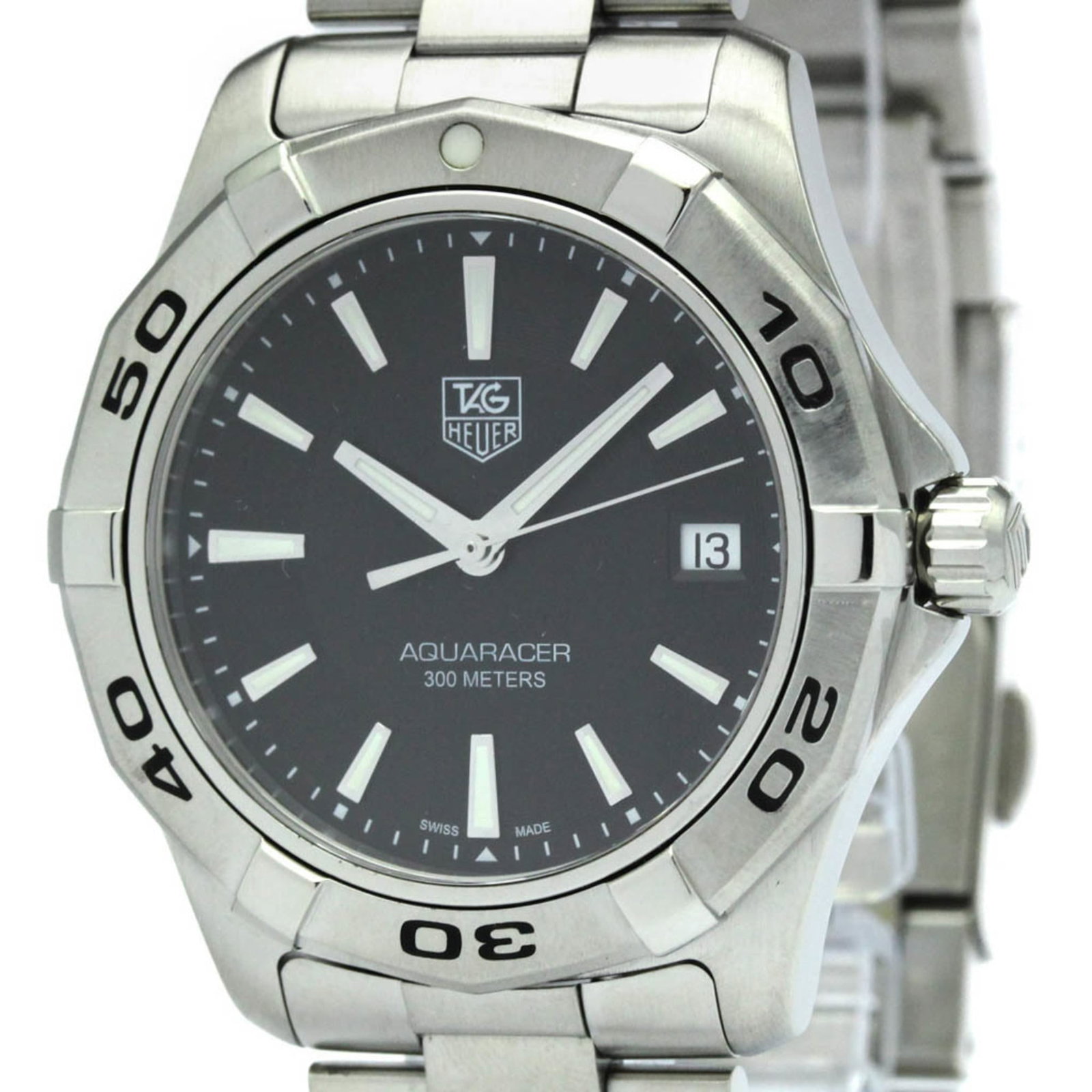 Wristwatch Tag Heuer: Wristwatch Tag Heuer A sleek and sporty timepiece, this Tag Heuer wristwatch boasts a durable stainless steel case and band, perfect for everyday wear. With its classic black dial and 40mm diameter, i