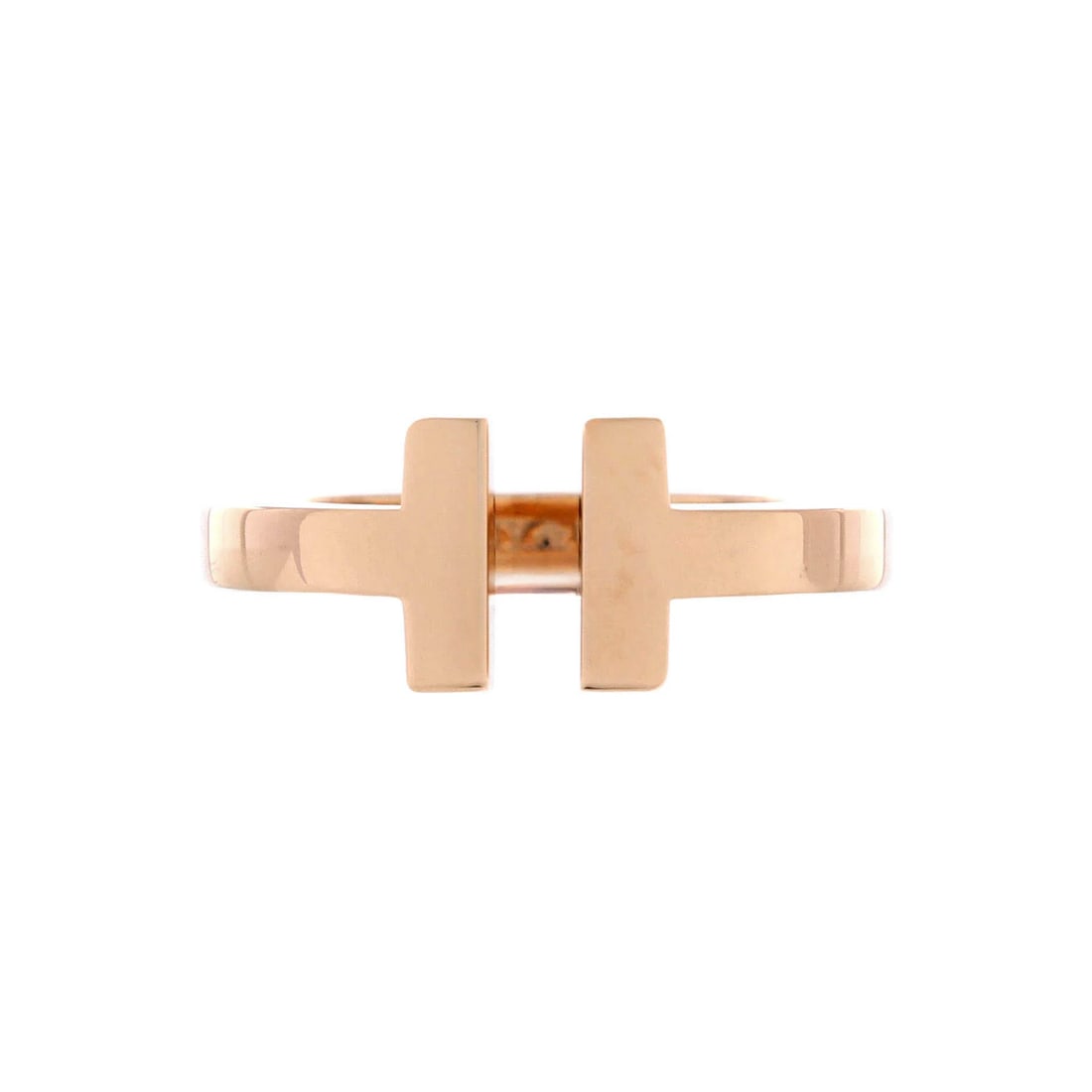Tiffany & Co. T Square Ring 18K Rose Gold: Tiffany & Co. T Square Ring 18K Rose Gold Experience the timeless elegance of Tiffany & Co.'s iconic T Square Ring, crafted in 18K rose gold with a subtle hint of luxury. This exquisite piece boasts