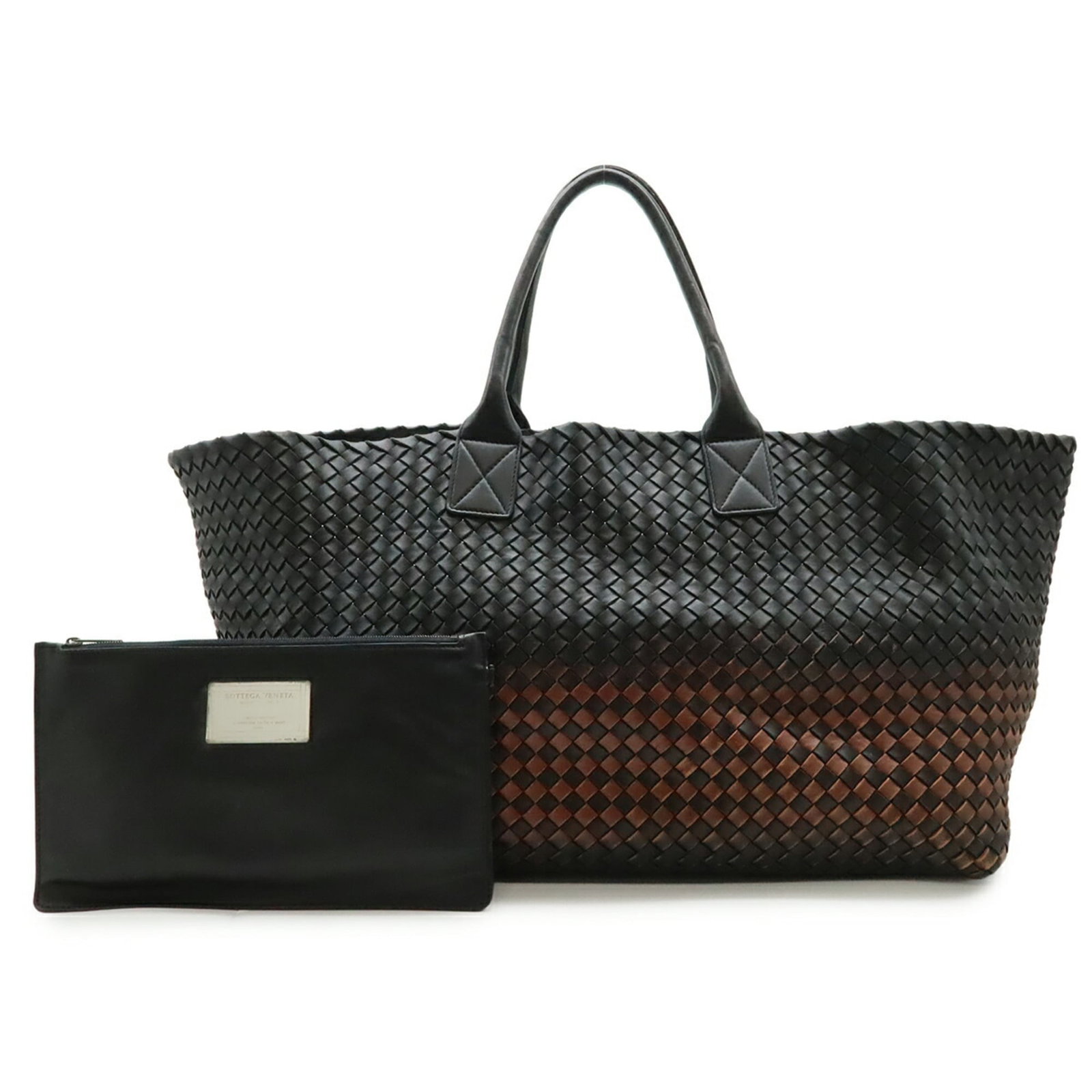 Bottega Veneta leather tote bag: Bottega Veneta leather tote bag A timeless Bottega Veneta leather tote bag in sleek black or rich brown, crafted from high-quality leather with clean lines and classic design. With its spacious