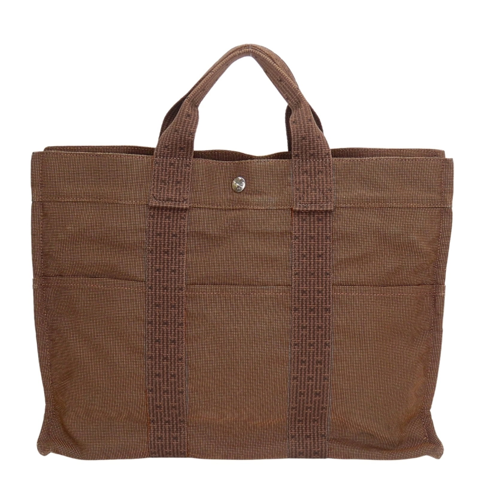 Hermes Tote Bag Polyester: Hermes Tote Bag Polyester A pre-owned Hermes tote bag in rich brown leather, with an open top and spacious interior pockets, offers a stylish and practical solution for daily errands or travel. With