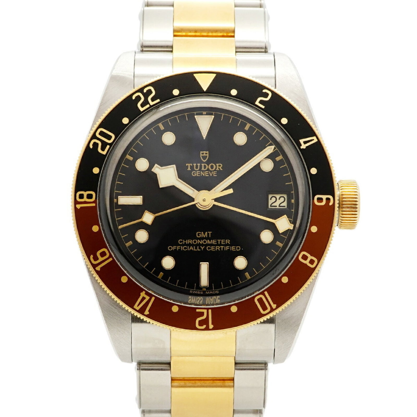 Tudor Wristwatch: Tudor Wristwatch A sleek and sophisticated Tudor wristwatch, with its 41mm stainless steel case and yellow gold accents, boasts a timeless design that exudes classic elegance. The black dial provides