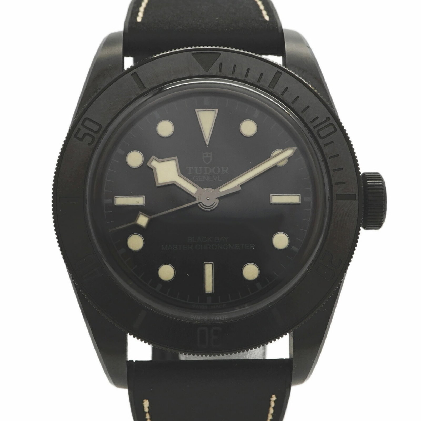 Tudor Wristwatch: Tudor Wristwatch A sleek and sophisticated Tudor wristwatch, this 41mm timepiece boasts a classic design with a black leather strap and rubber accents, perfect for everyday wear. With its durable cons