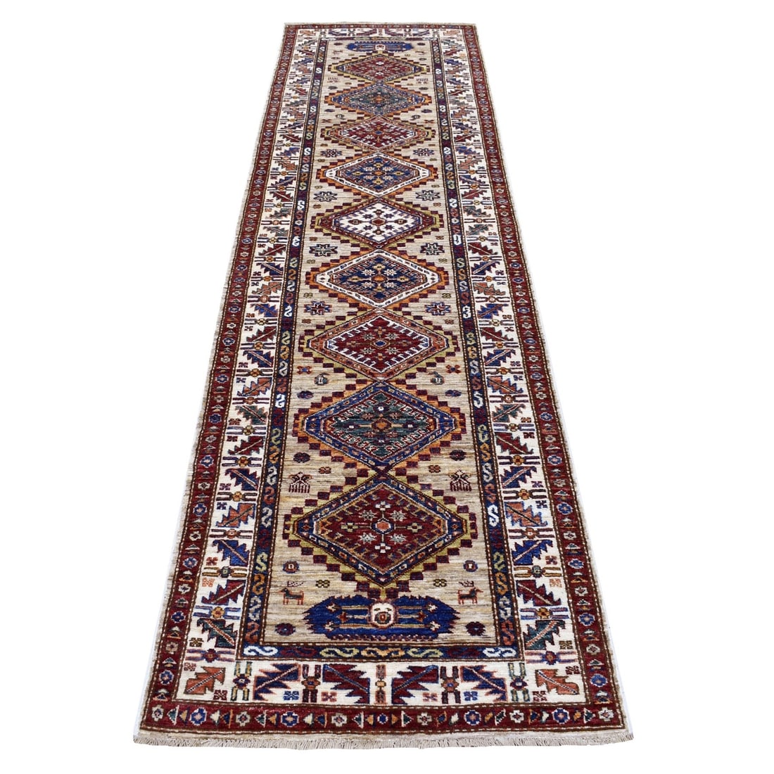 2'8"x10' Beige Geometric Design Natural Wool Super Kazak Hand-Knotted Rug: 2'8"x10' Beige Geometric Design Natural Wool Super Kazak Hand-Knotted Rug Experience the rich heritage of Afghan craftsmanship with this stunning 2'8"x10' beige geometric design natural wool super