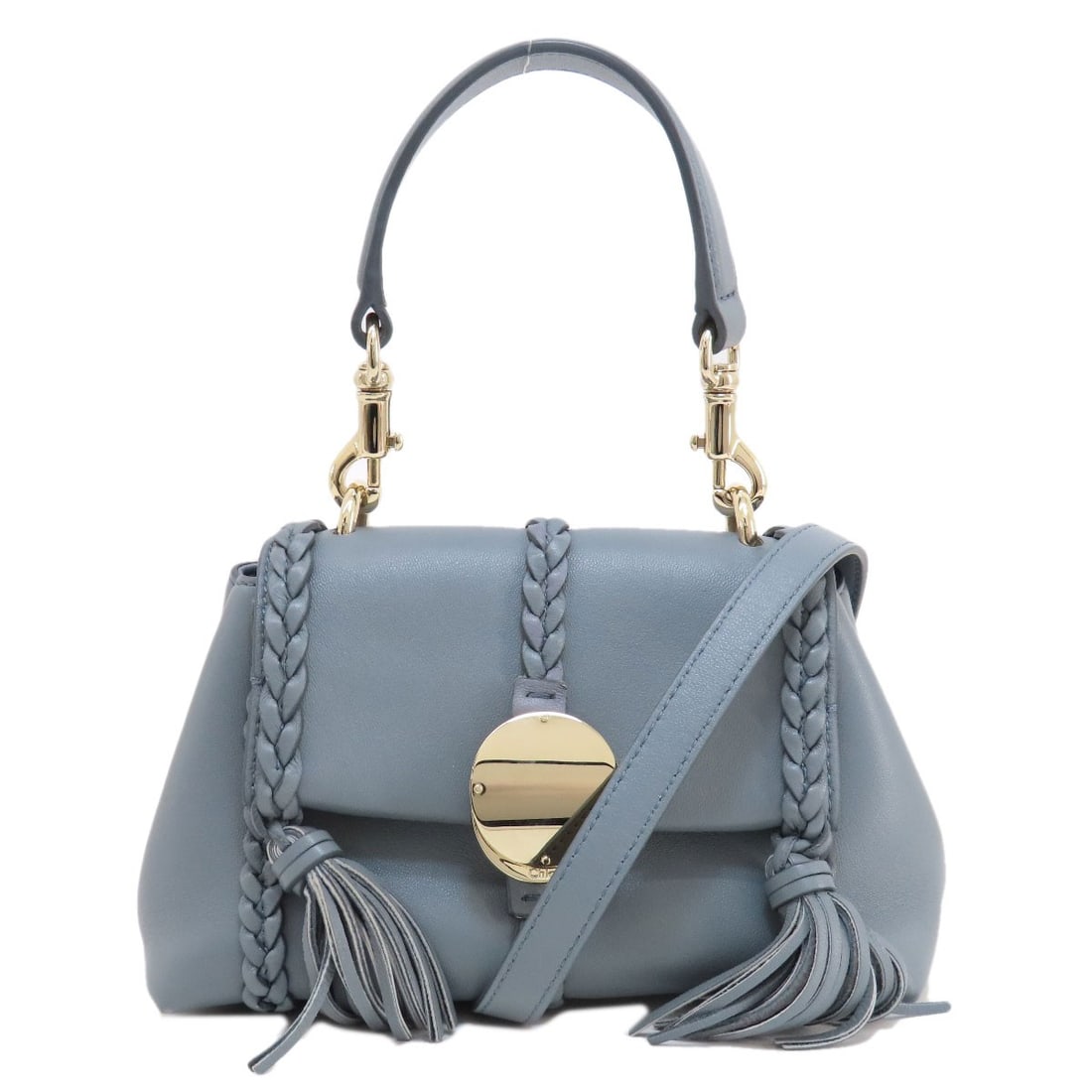 Leather Chloe Mini 2way Handbag Penelope: Leather Chloe Mini 2way Handbag Penelope The Chloe Mini Penelope is a timeless and sophisticated leather handbag, crafted in Italy from high-quality gray leather. Its classic design and versatile 2-wa