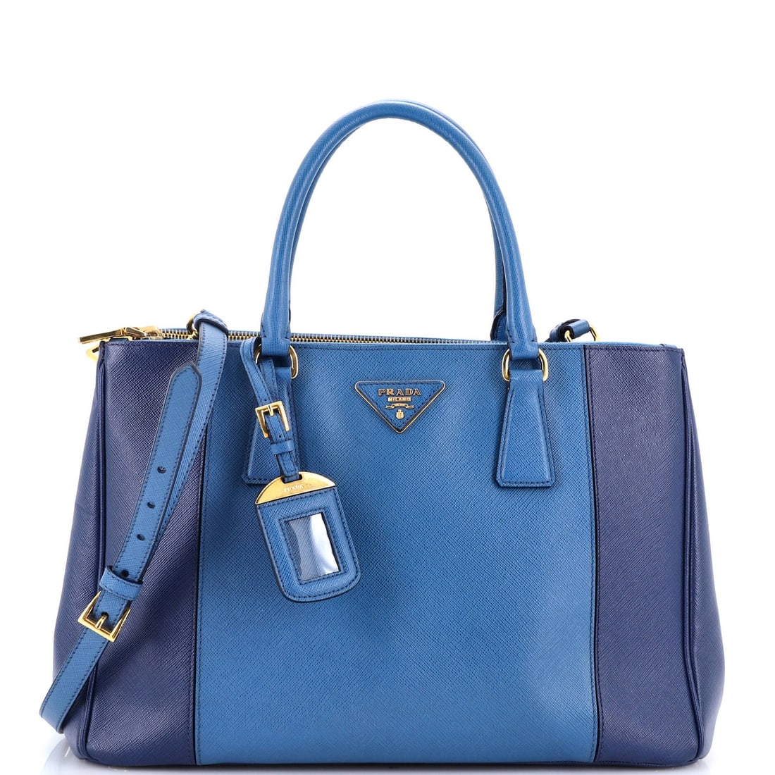 Medium Lux leather saffiano double zip Prada tote: Medium Lux leather saffiano double zip Prada tote A stunning Prada Medium Lux Saffiano double zip tote in blue, boasting sleek lines and premium leather construction. The iconic Bicolor design adds a