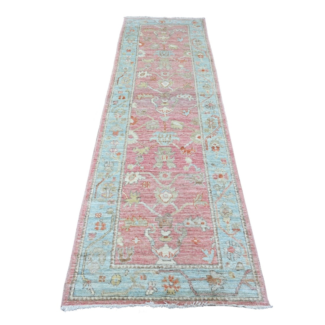 2'9"x9'7" Pink Angora Oushak Vines Design Hand Knotted Wool Runner Rug: 2'9"x9'7" Pink Angora Oushak Vines Design Hand Knotted Wool Runner Rug Experience the vibrant beauty of India with this stunning 2'9"x9'7" pink Angora Oushak vines design hand knotted wool runner