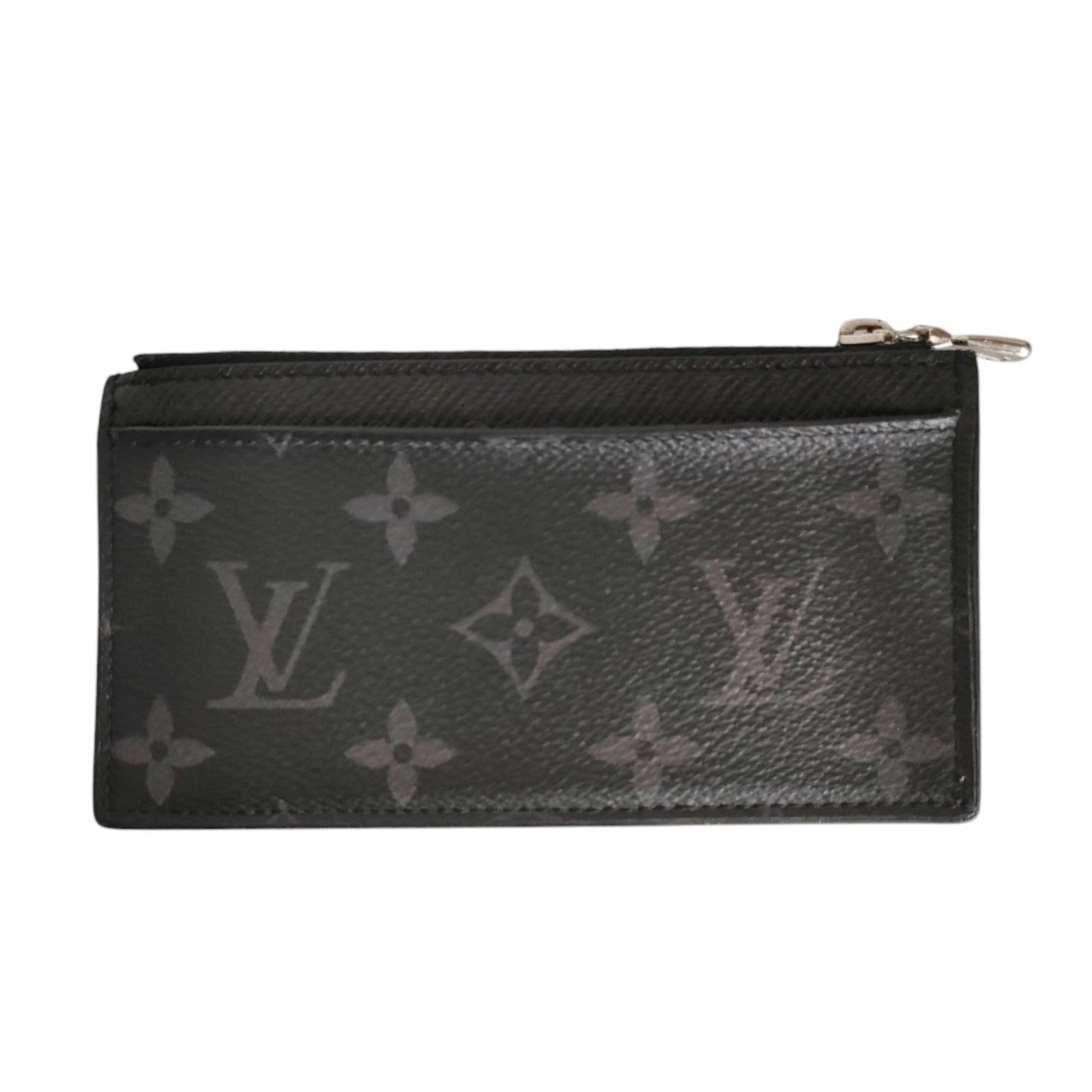 Louis Vuitton coin case: Louis Vuitton coin case A sleek and sophisticated accessory for the modern collector, this Louis Vuitton coin case boasts the iconic Monogram Eclipse pattern in high-quality black leather. With its