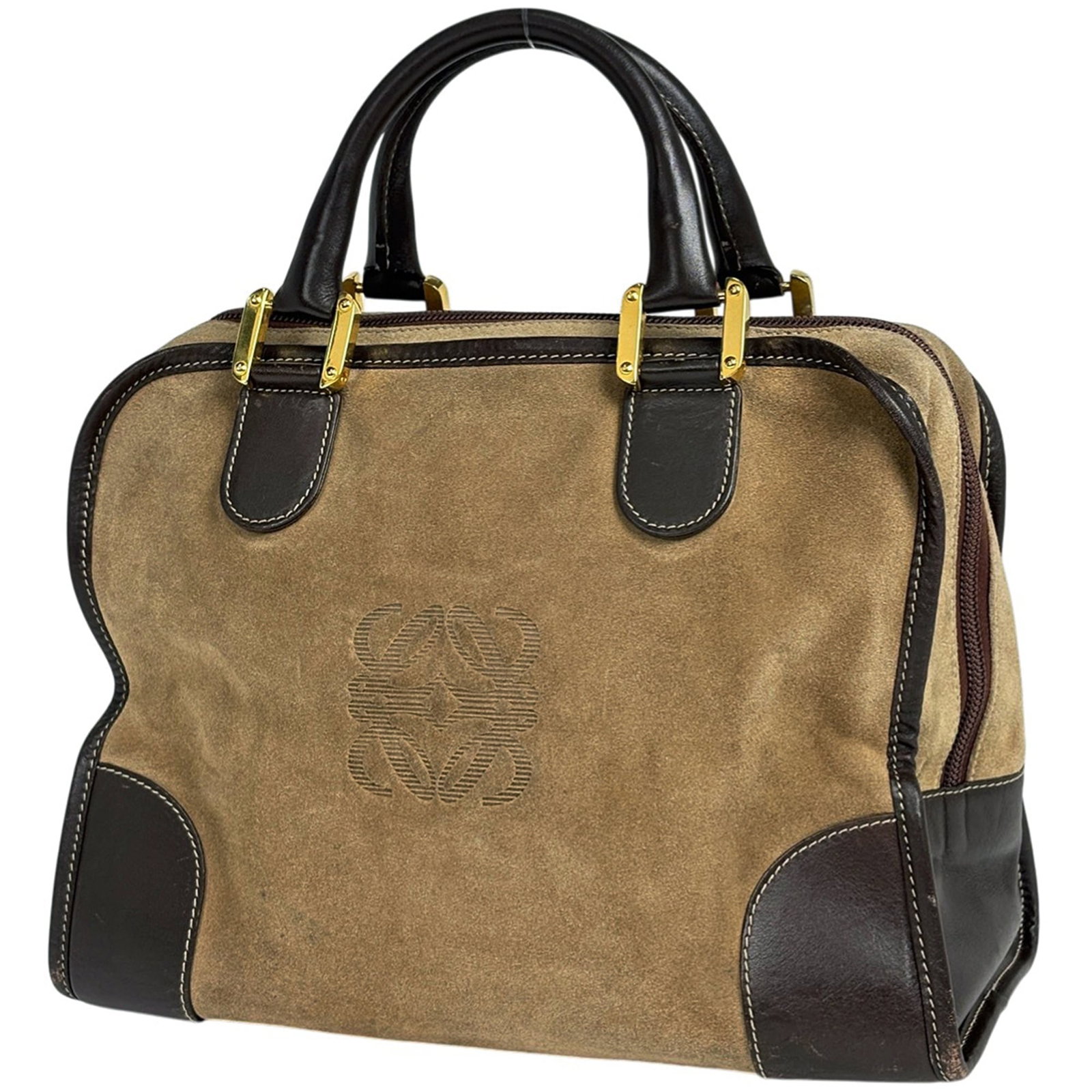 Loewe Handbag Suede: Loewe Handbag Suede A luxurious Loewe handbag in rich, velvety suede, perfect for adding a touch of sophistication to any outfit. With its classic design and timeless appeal, this brown beauty is